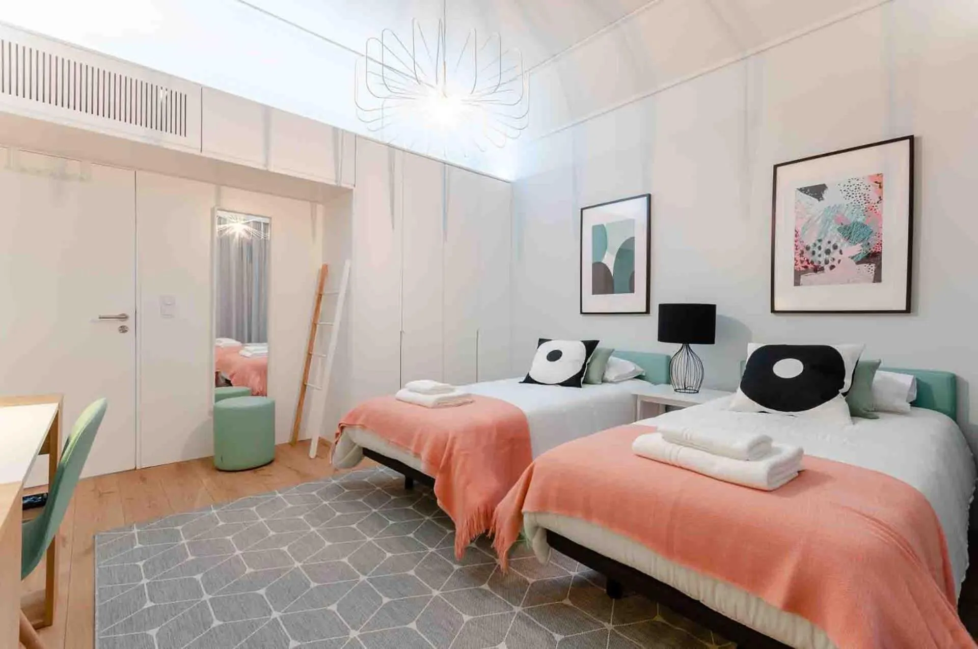 Bed in NLC Rooms & Suites