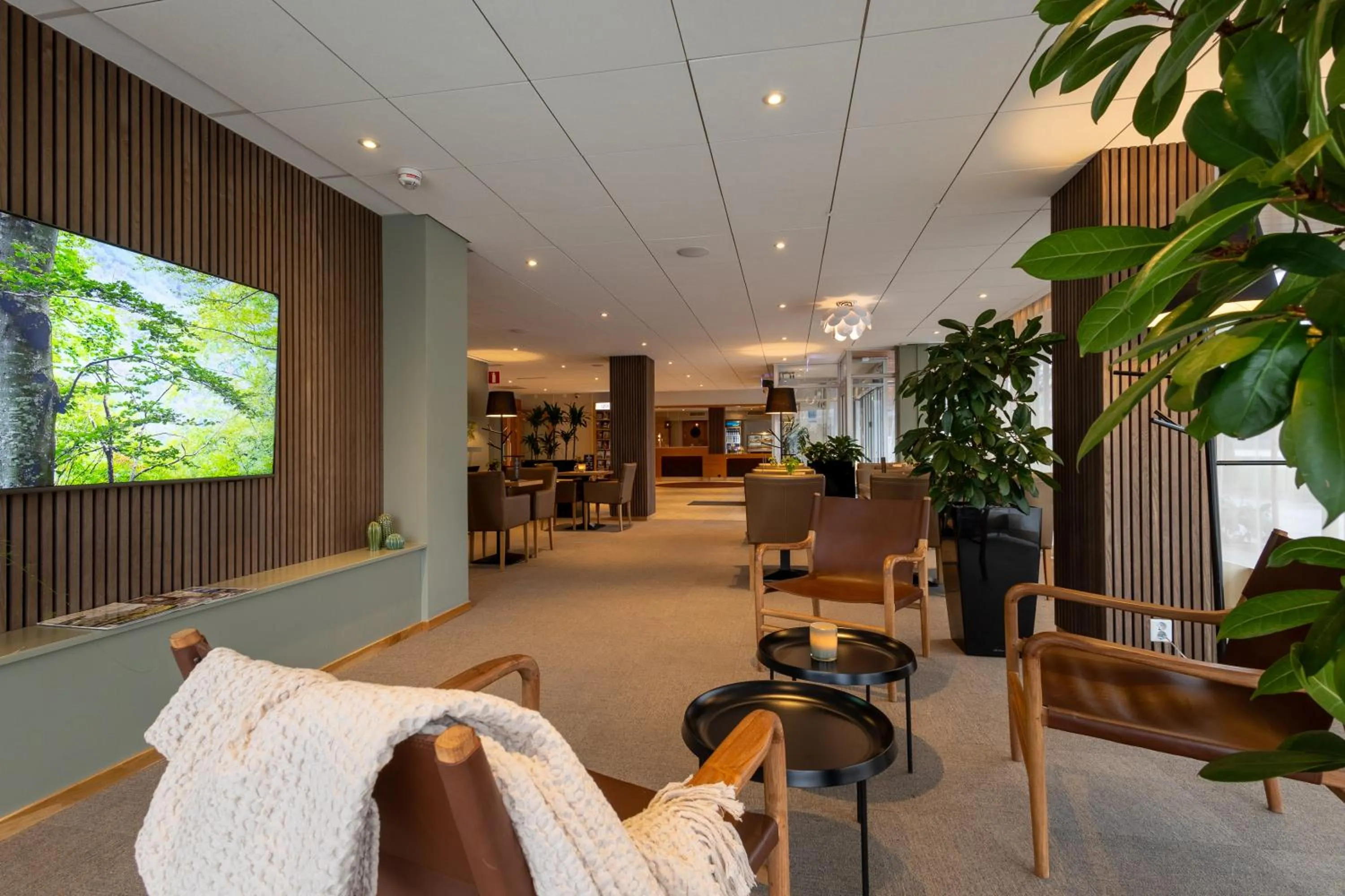 Communal lounge/ TV room in Spar Hotel Gårda