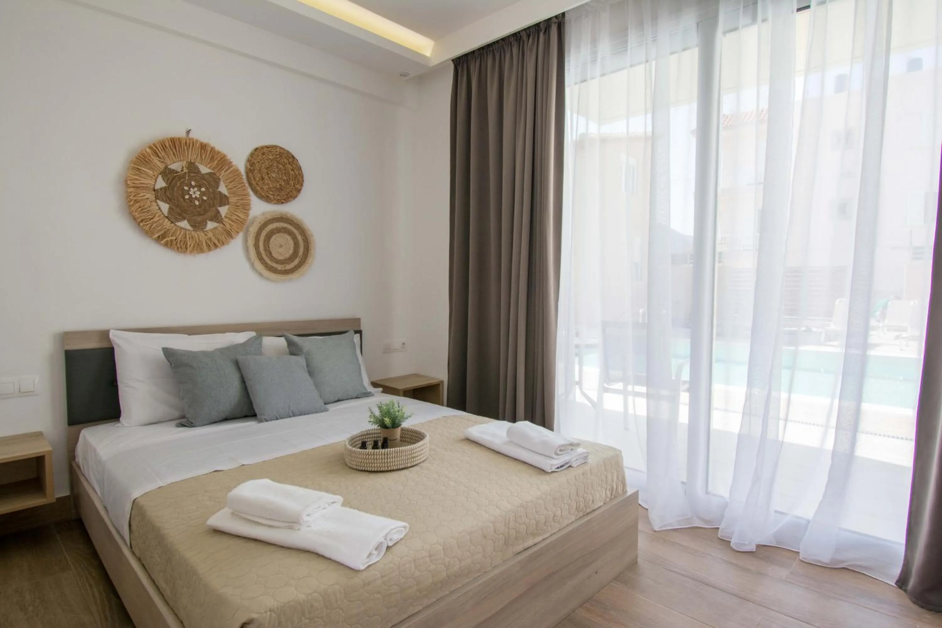 Bed in Michalianna Suites "by Checkin"