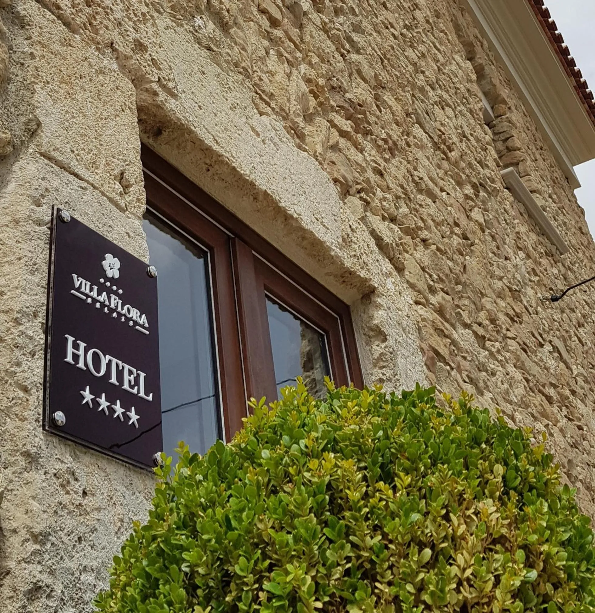 Facade/entrance in Hotel Villa Flora Relais