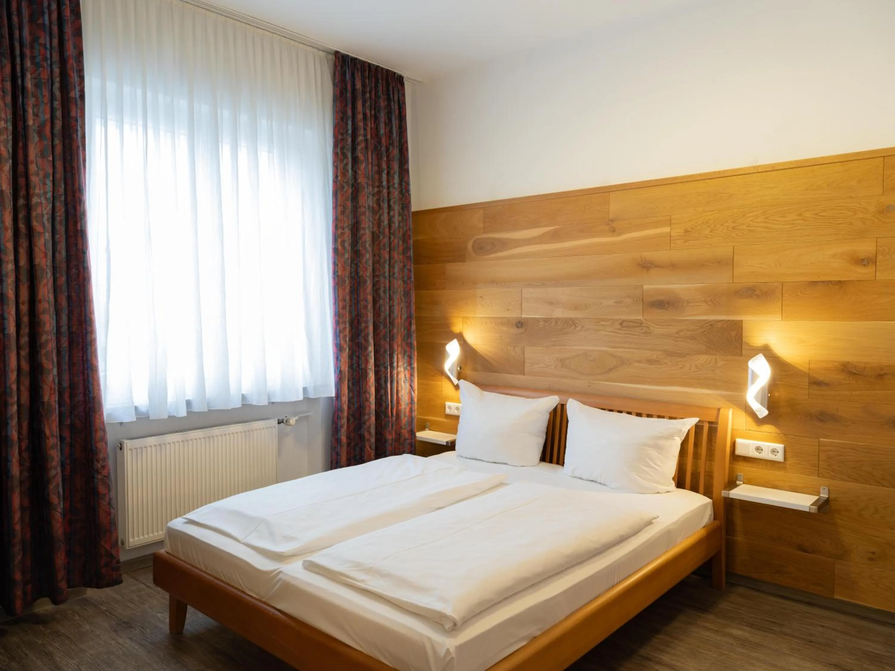 Photo of the whole room, Bed in DONAUHOTEL Ingolstadt