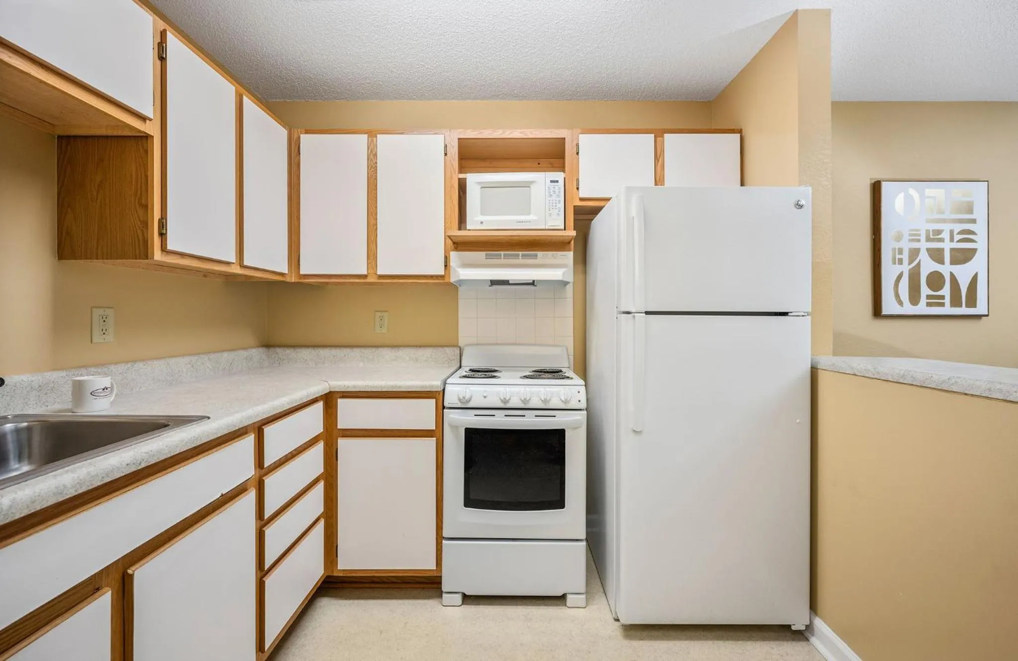 Kitchen or kitchenette in Affordable Suites Wilson