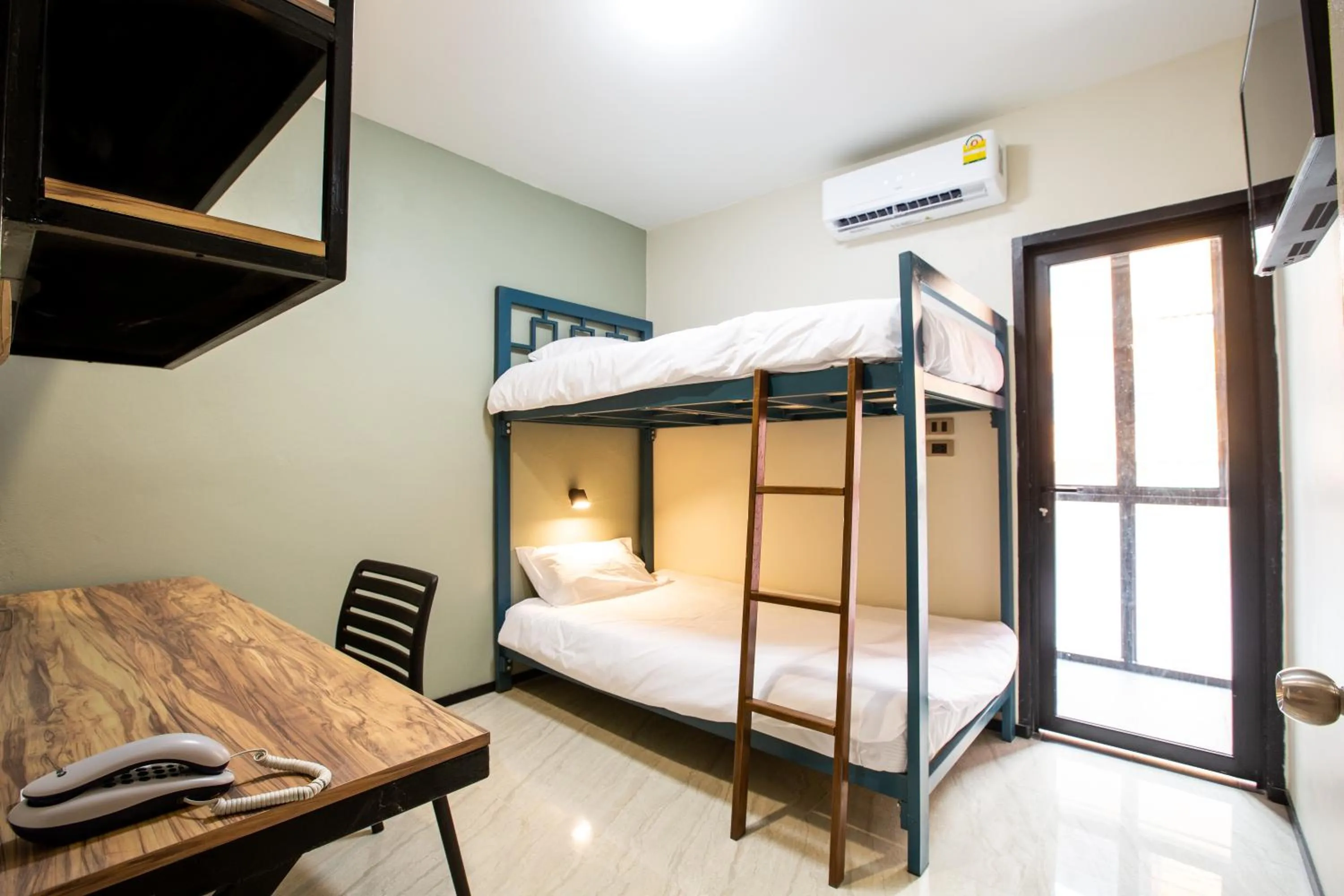 Property building, Bed in Kaelyn Cozy Living