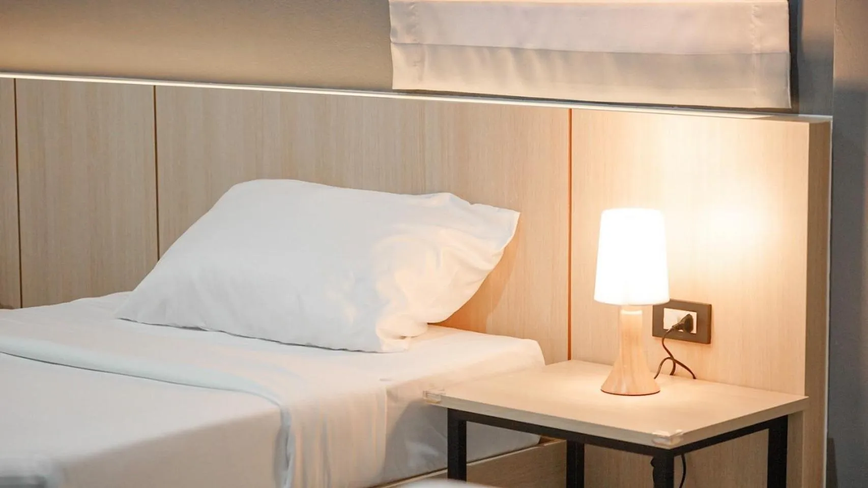 Bed in Boonsiri Boutique Hotel