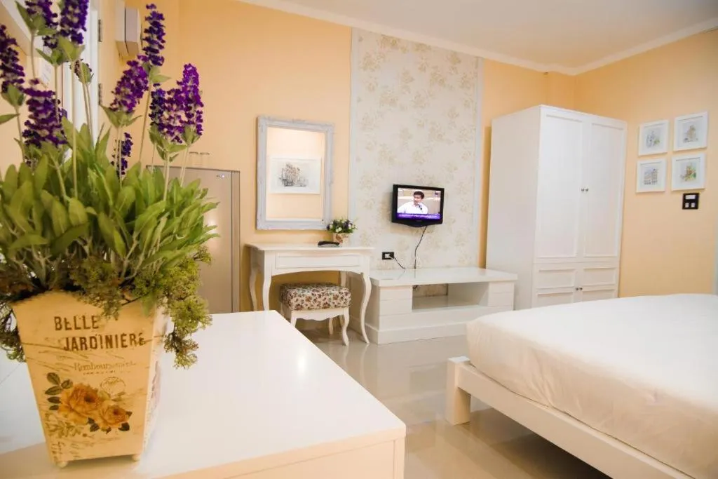 Bed in Boonsiri Boutique Hotel