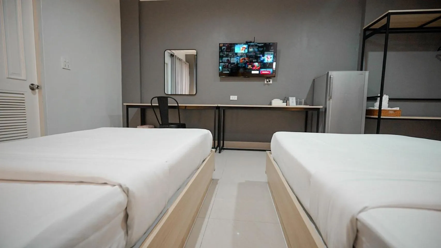 Bed in Boonsiri Boutique Hotel