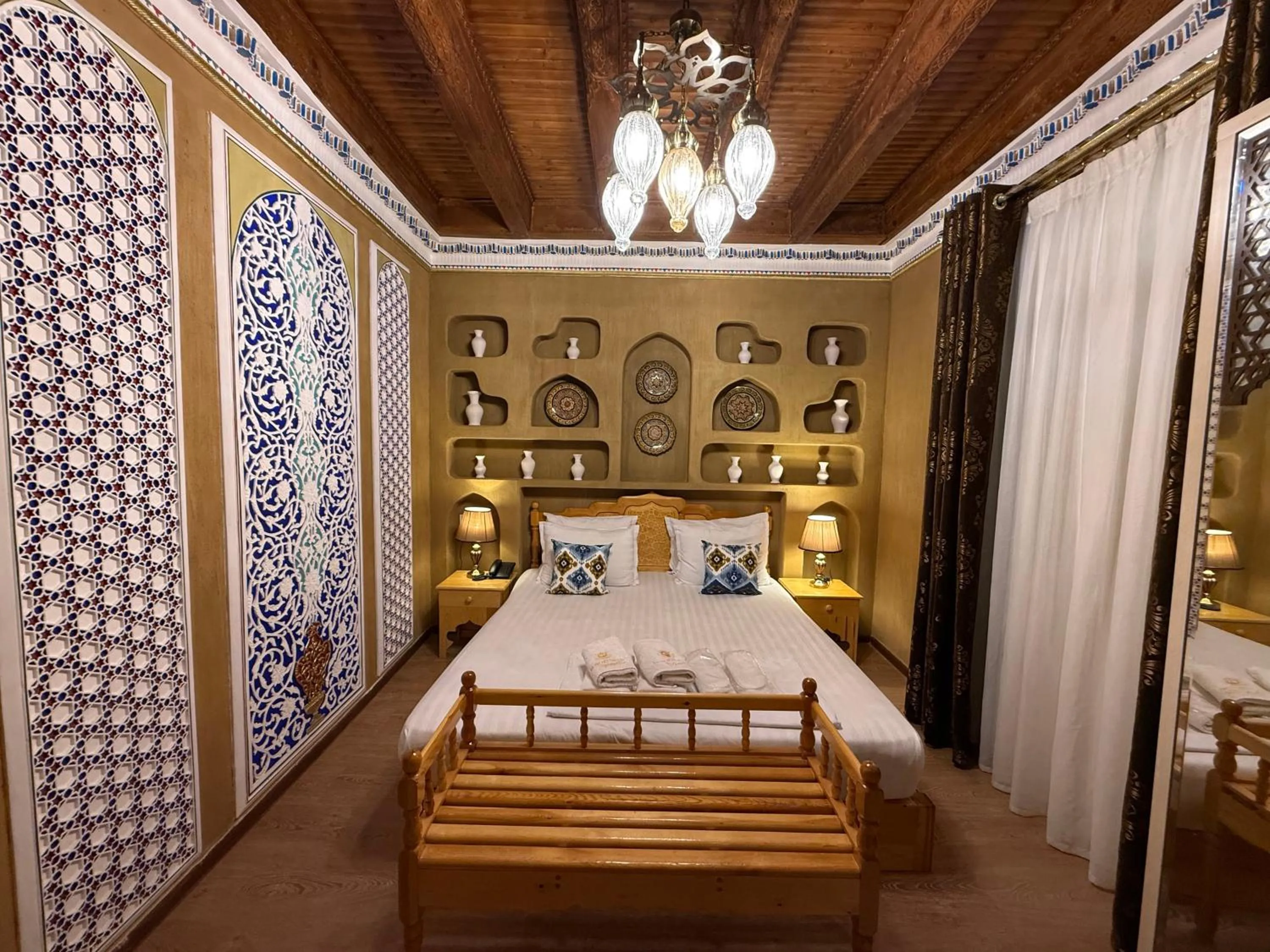 Bed in Basilic Boutique Hotel