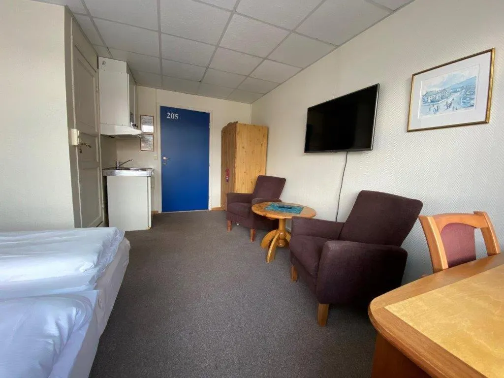 Photo of the whole room, Bed in Hotel Svartisen