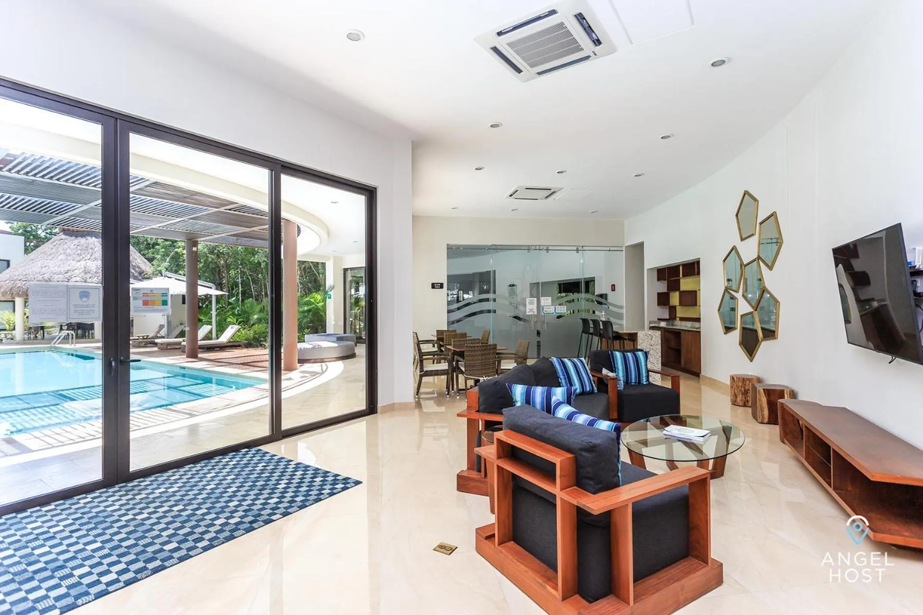 Seating area in Ciudad Mayakoba Homes by Vimex