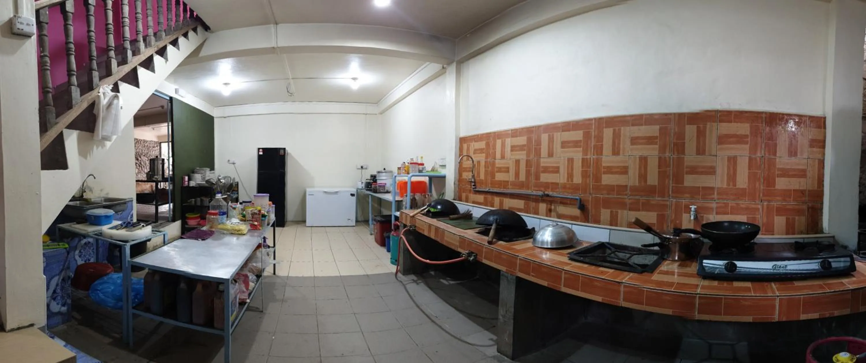 Kitchen or kitchenette in Kupi-Kupi & Stay