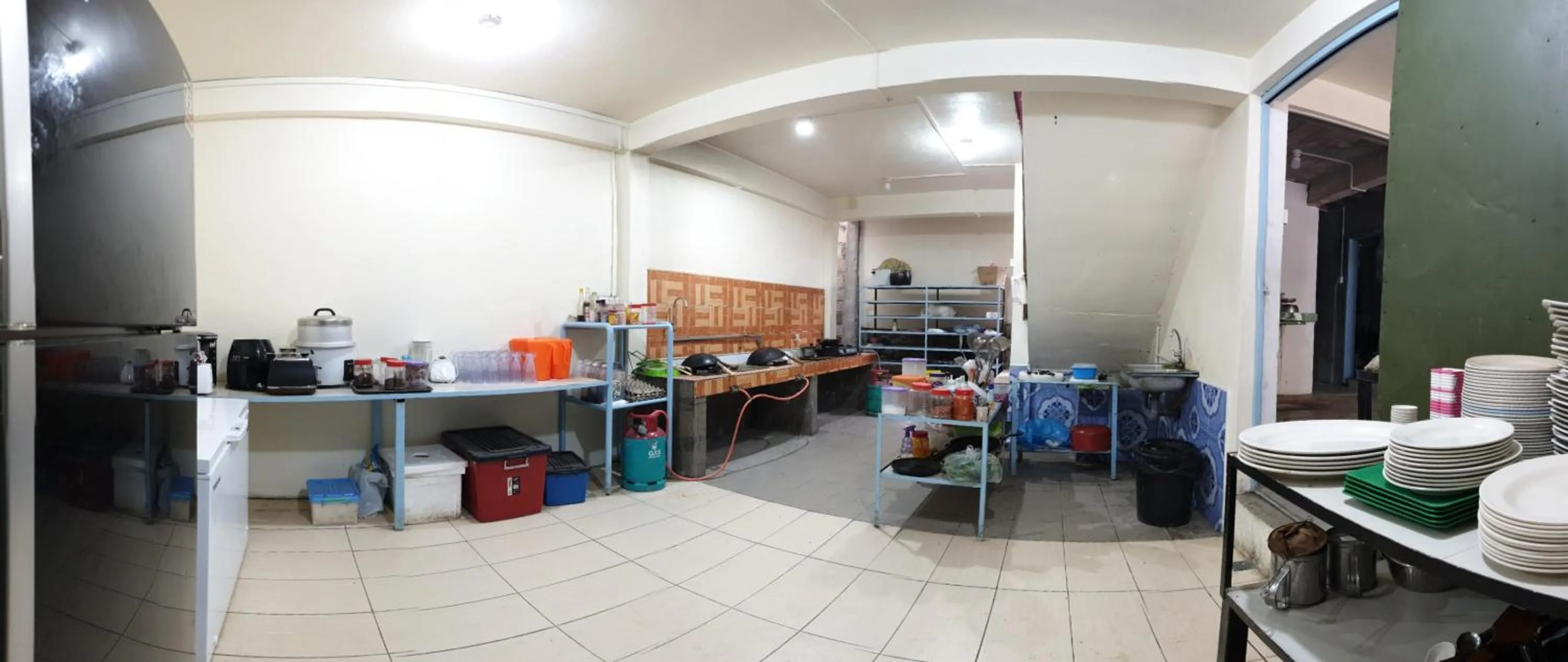Kitchen or kitchenette in Kupi-Kupi & Stay