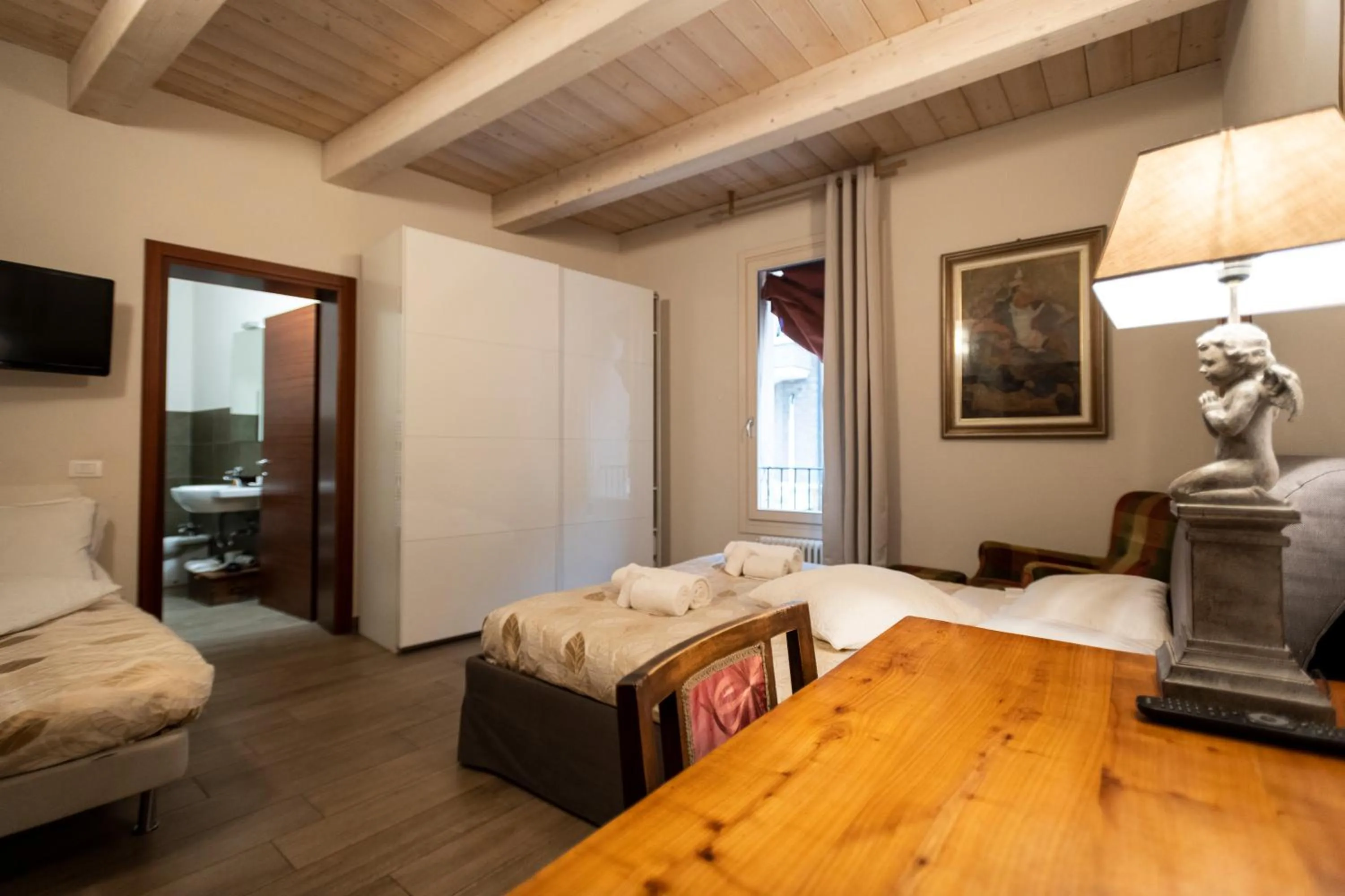 Bed in Al Battistero Luxury Suite