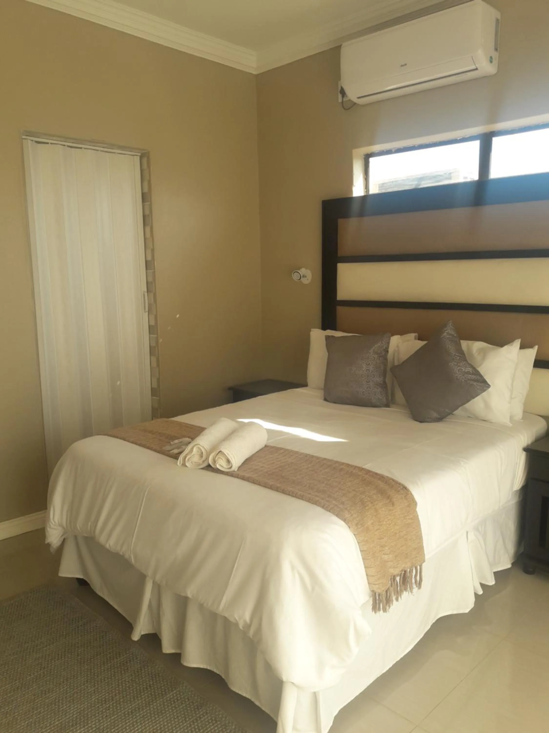 Bed in Vakhusi Guesthouse