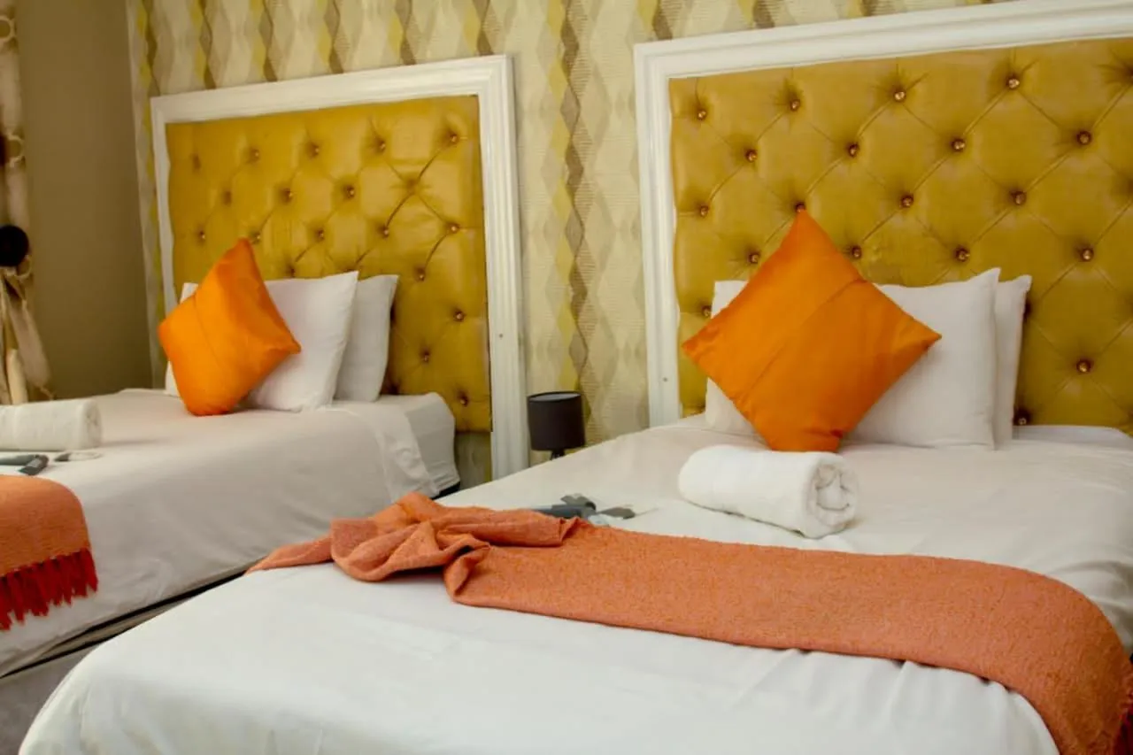 Bed in Vakhusi Guesthouse