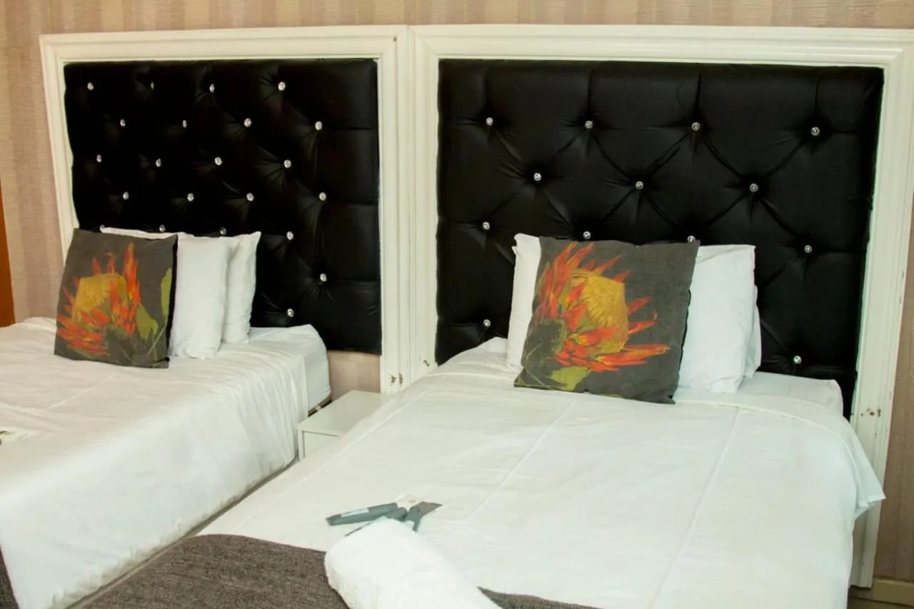 Bed in Vakhusi Guesthouse