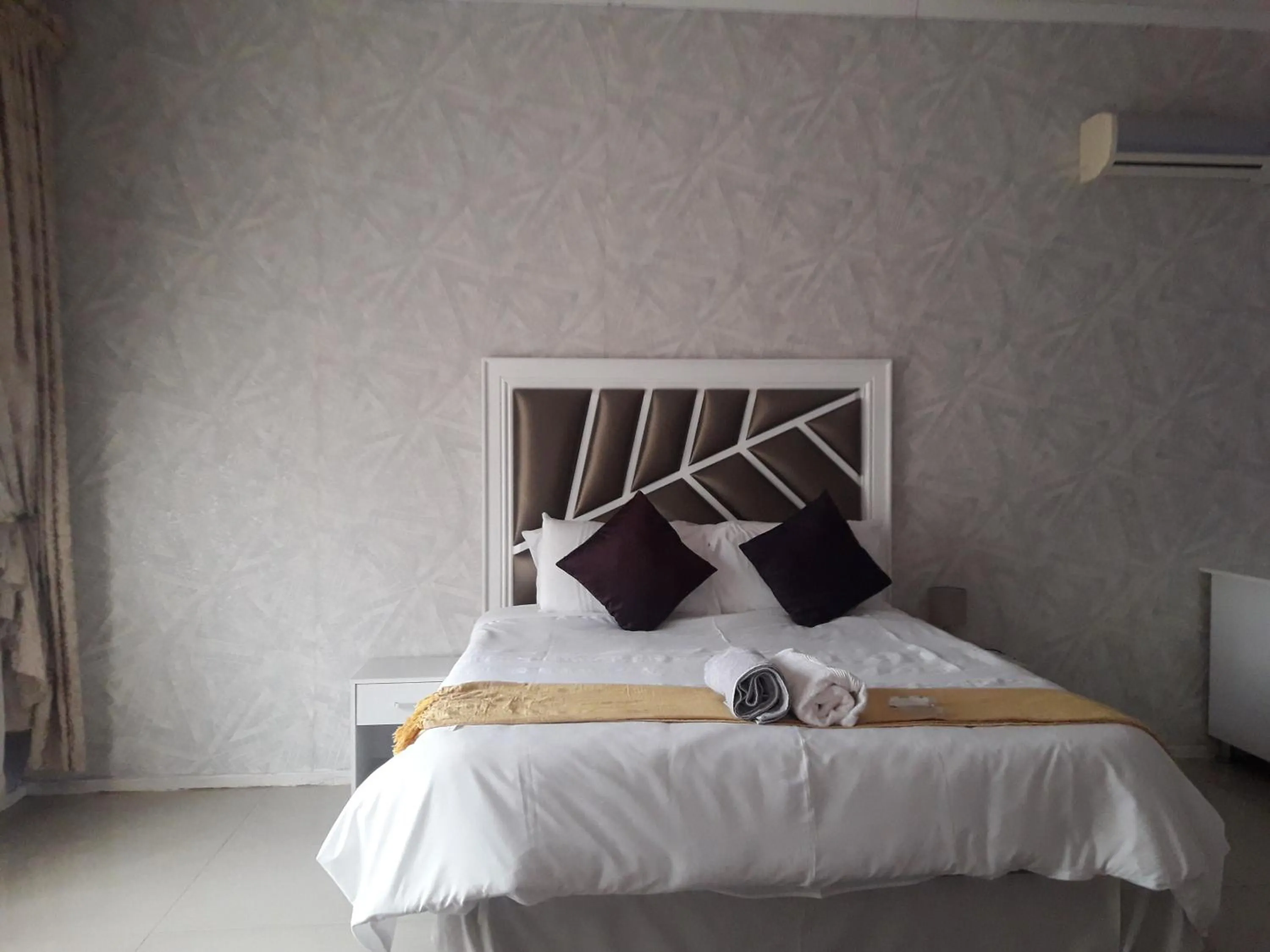 Bed in Vakhusi Guesthouse