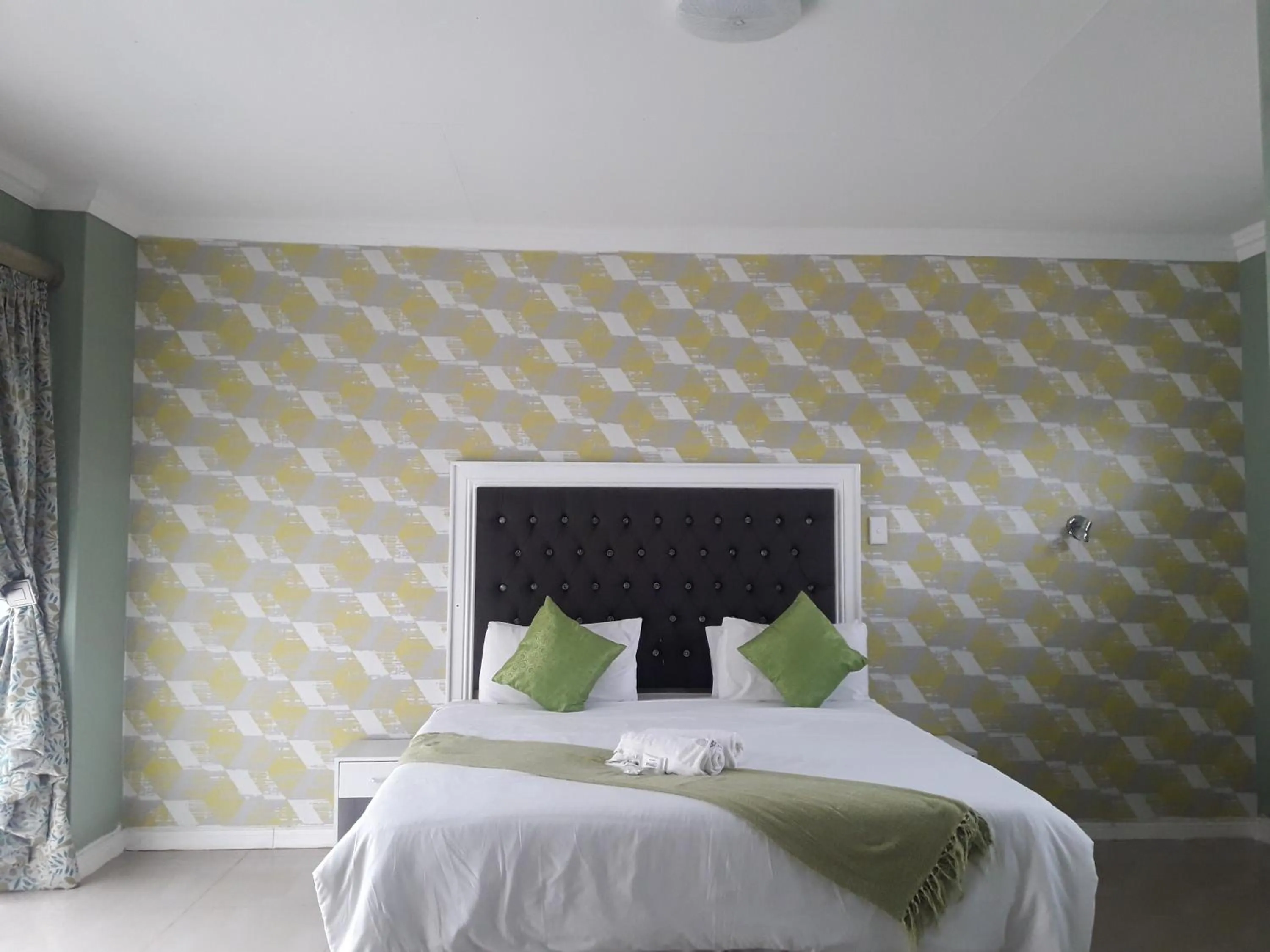 Bed in Vakhusi Guesthouse