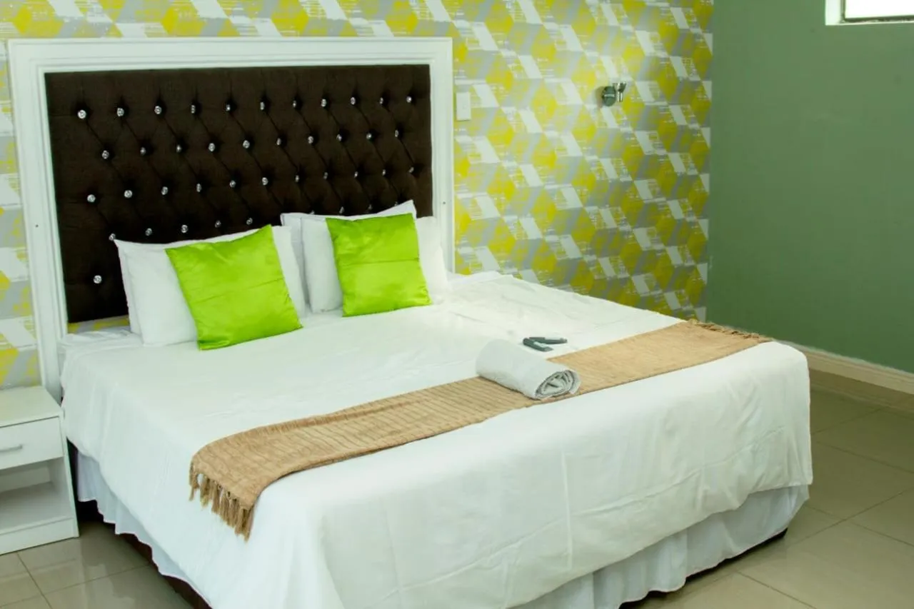 Bed in Vakhusi Guesthouse