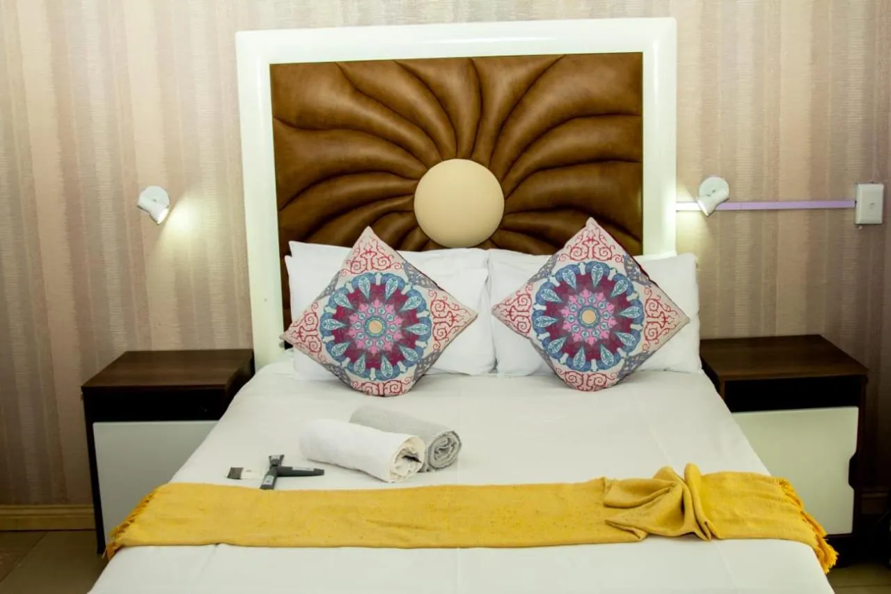 Bed in Vakhusi Guesthouse