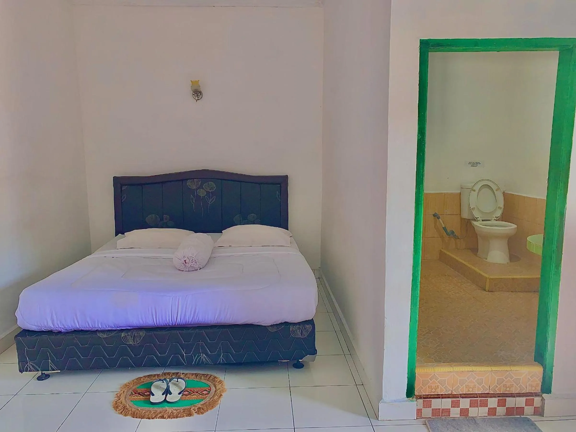 Bed in Hotel Rembulan