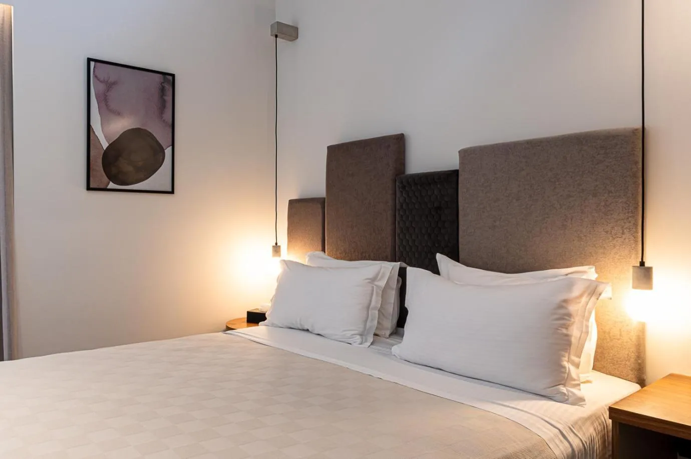 Bed in DOM Boutique Hotel