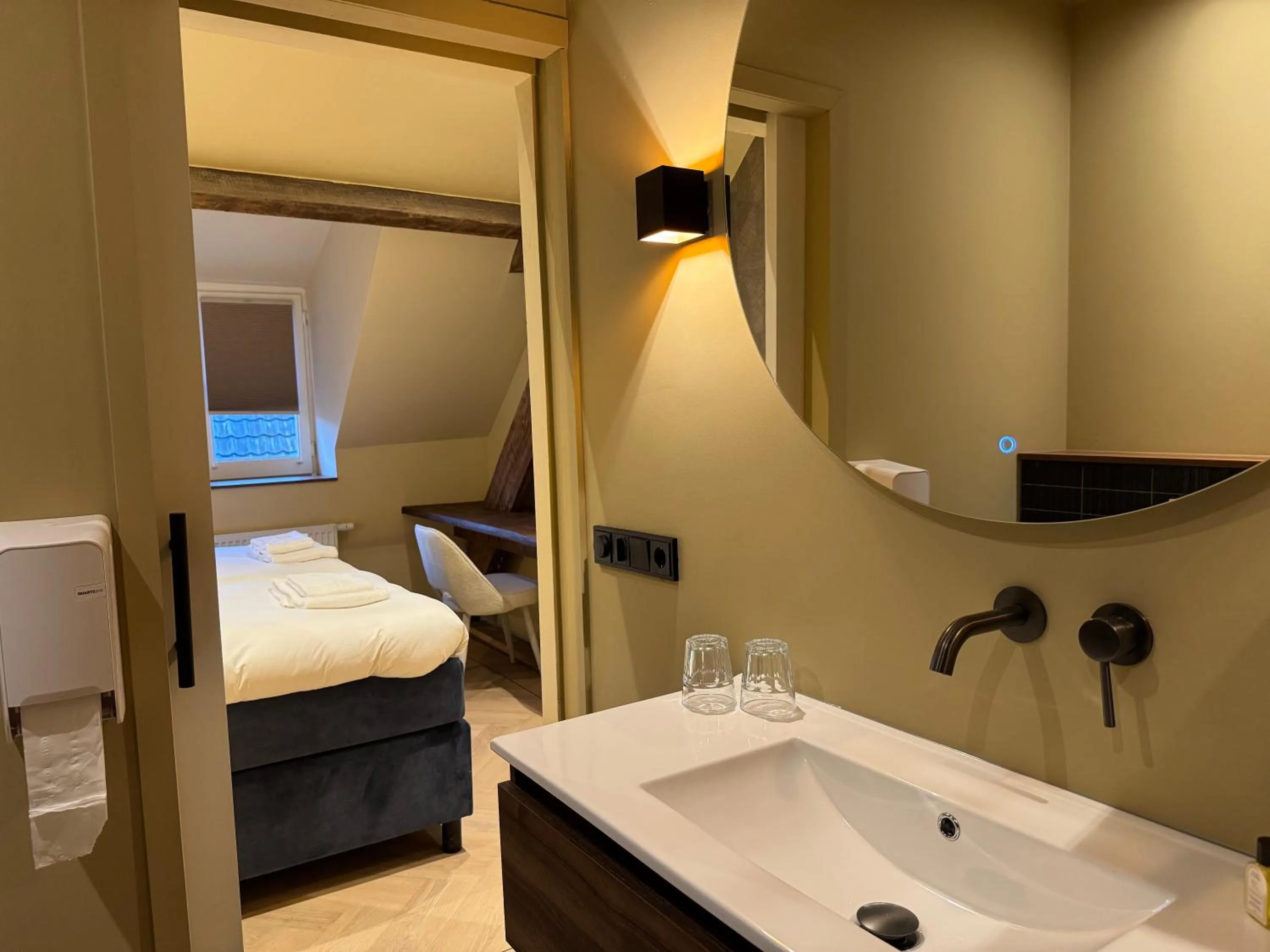 Bed in De Pastorie Bed & Breakfast