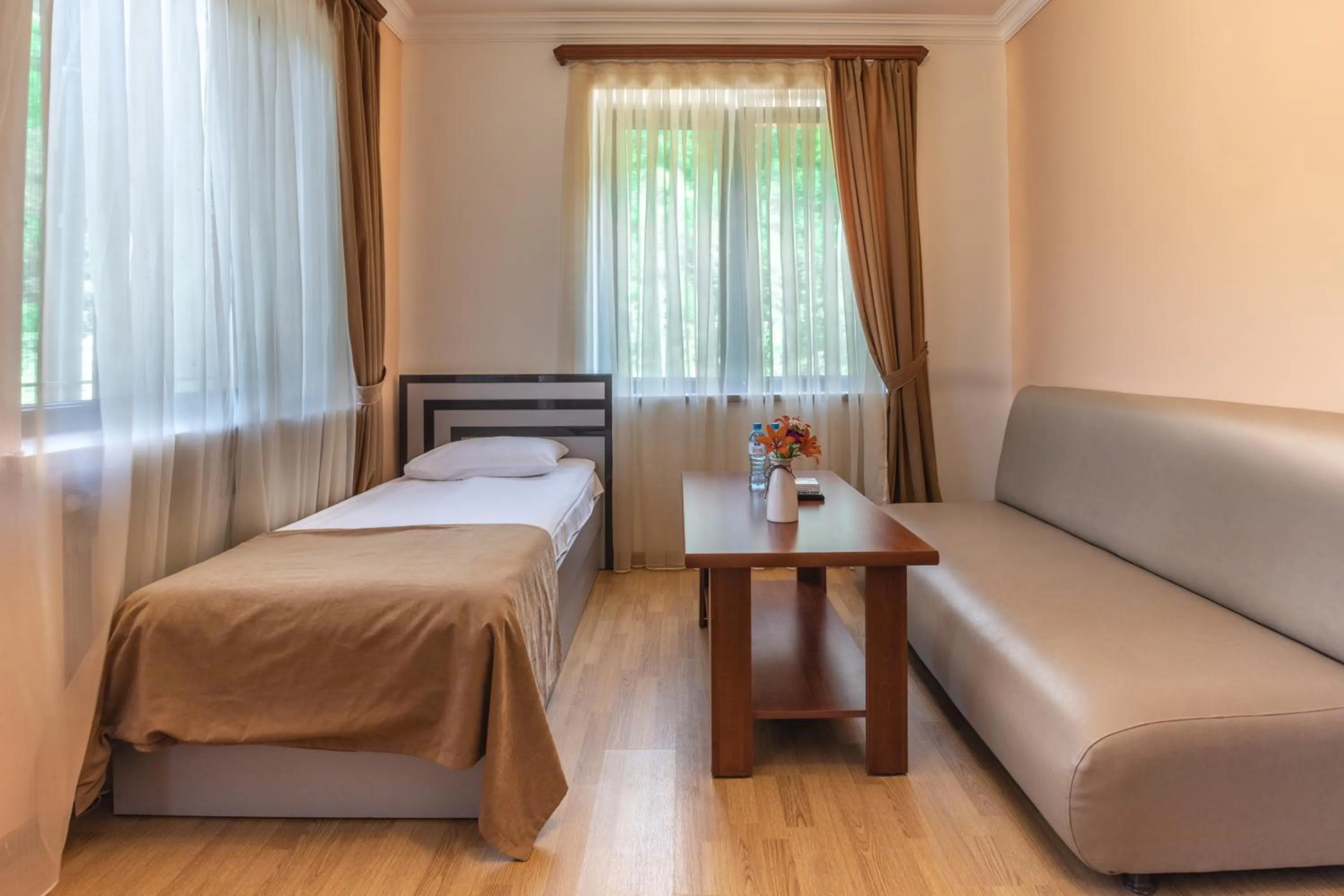 Bed in Ariana Family Hotel