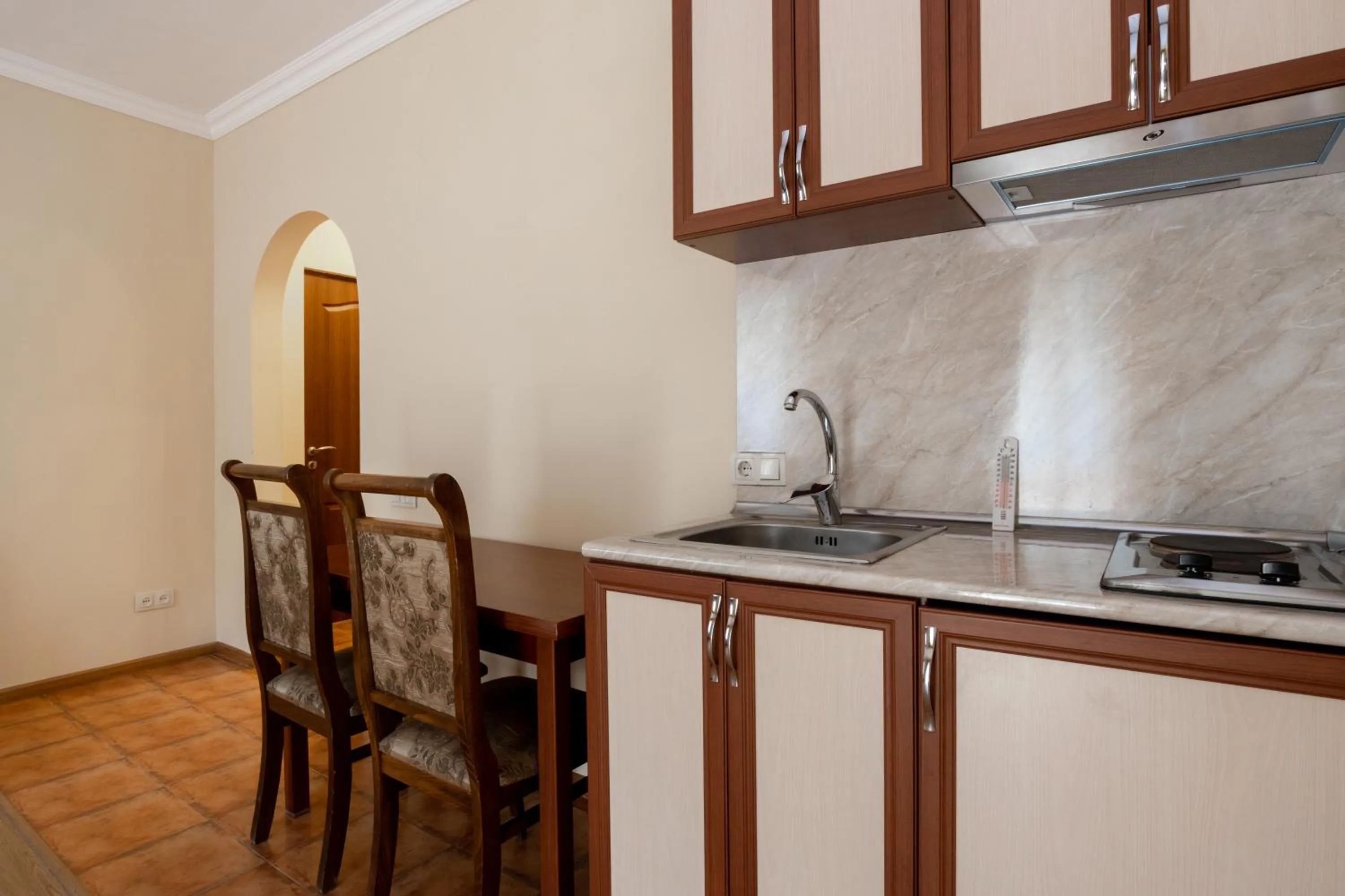 Kitchen or kitchenette in Ariana Family Hotel