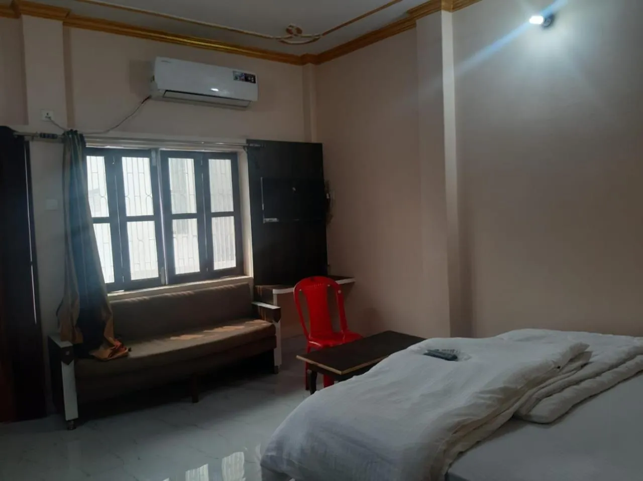 Photo of the whole room, Bed in Sita Inn Home Stay Away From Home By Hotel Sita Varanasi