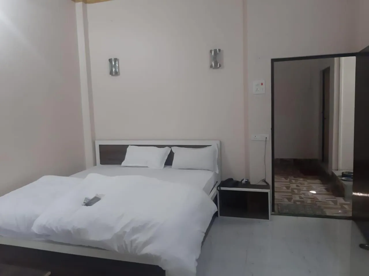 Photo of the whole room, Bed in Sita Inn Home Stay Away From Home By Hotel Sita Varanasi