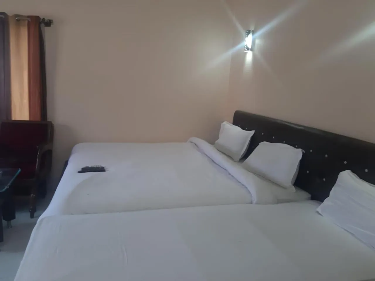 Photo of the whole room, Bed in Sita Inn Home Stay Away From Home By Hotel Sita Varanasi