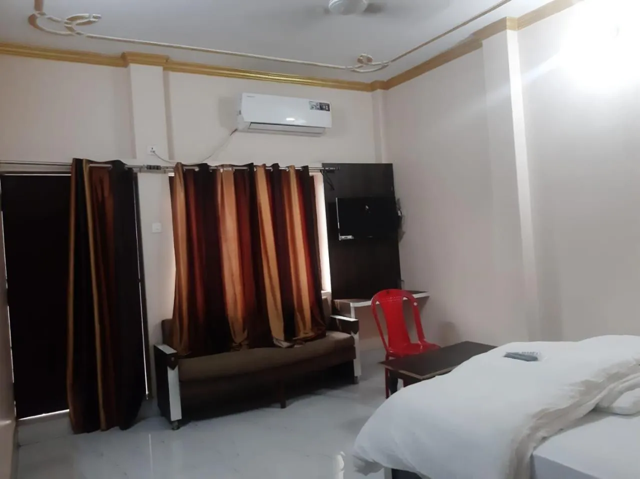 Photo of the whole room, Bed in Sita Inn Home Stay Away From Home By Hotel Sita Varanasi