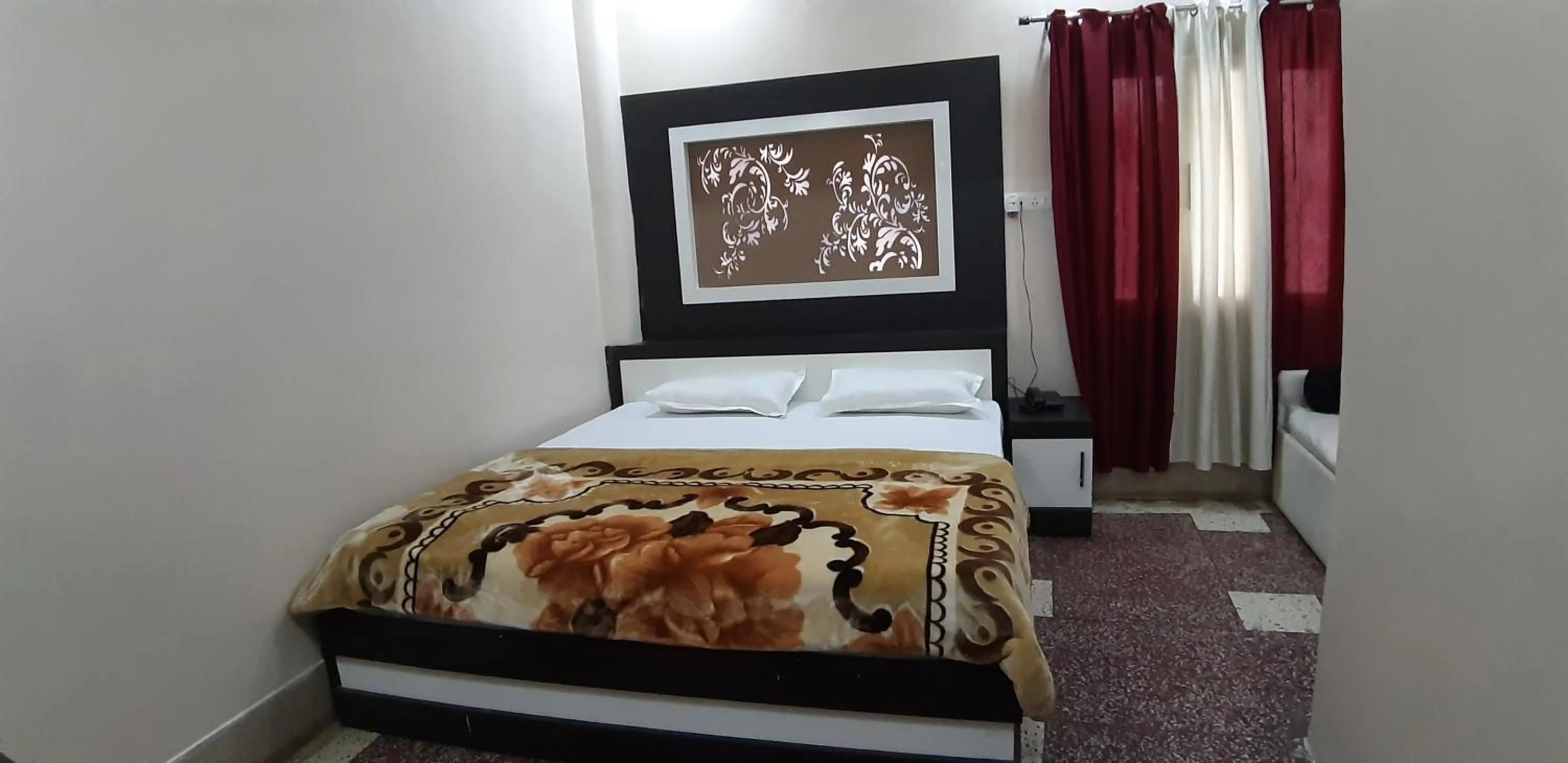 Photo of the whole room, Bed in Sita Inn Home Stay Away From Home By Hotel Sita Varanasi