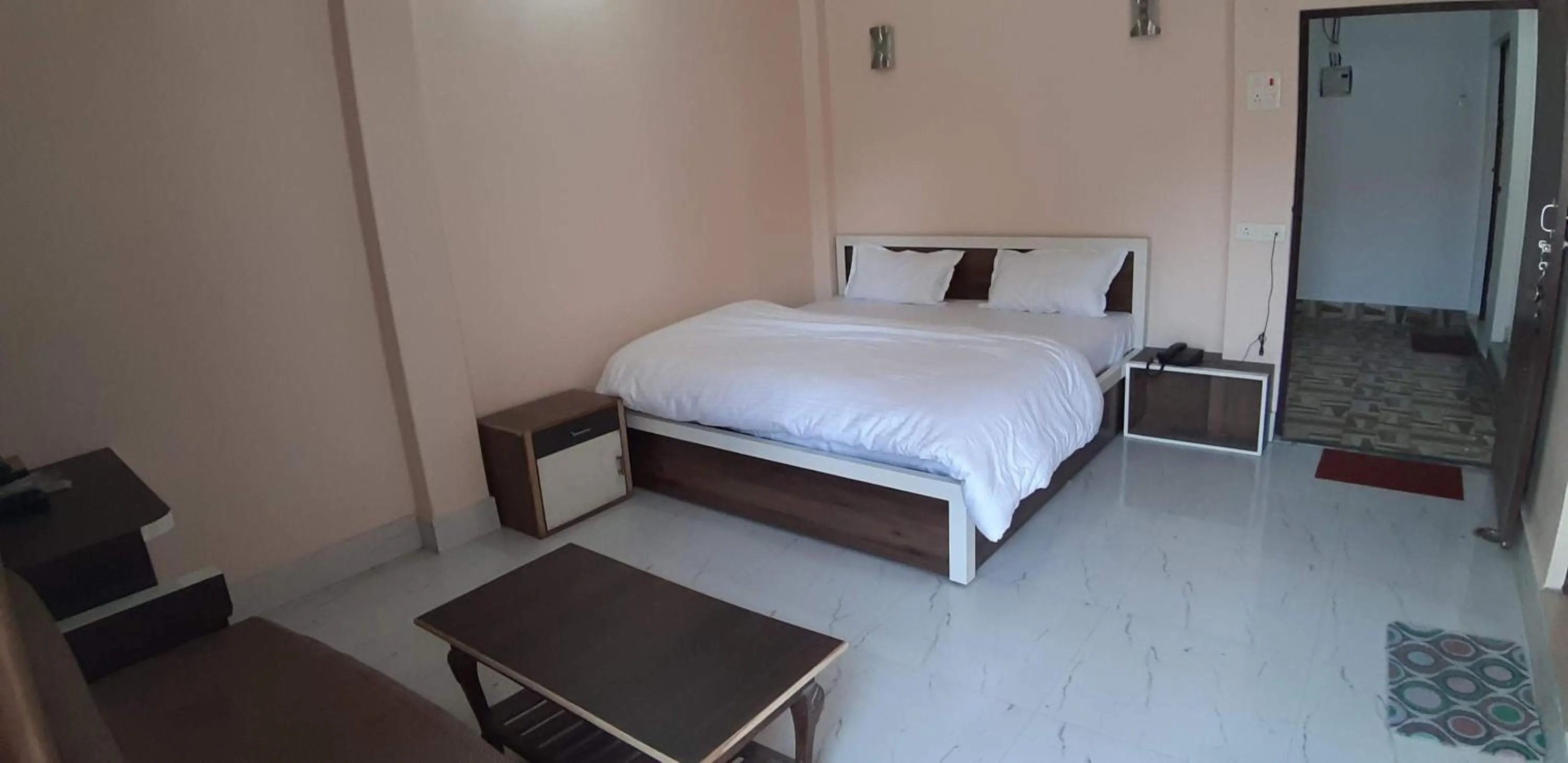Photo of the whole room, Bed in Sita Inn Home Stay Away From Home By Hotel Sita Varanasi