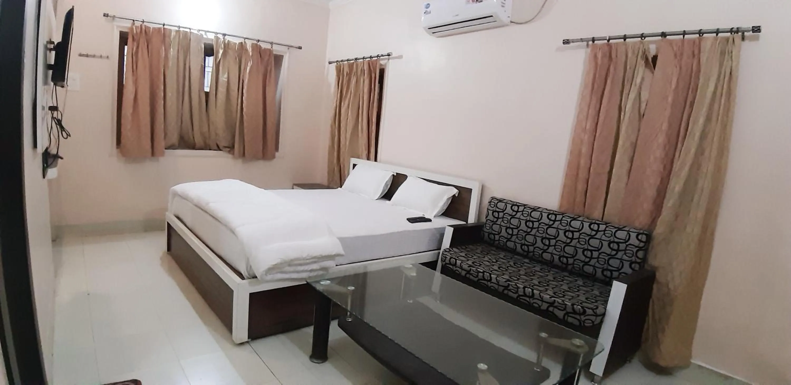 Photo of the whole room, Bed in Sita Inn Home Stay Away From Home By Hotel Sita Varanasi