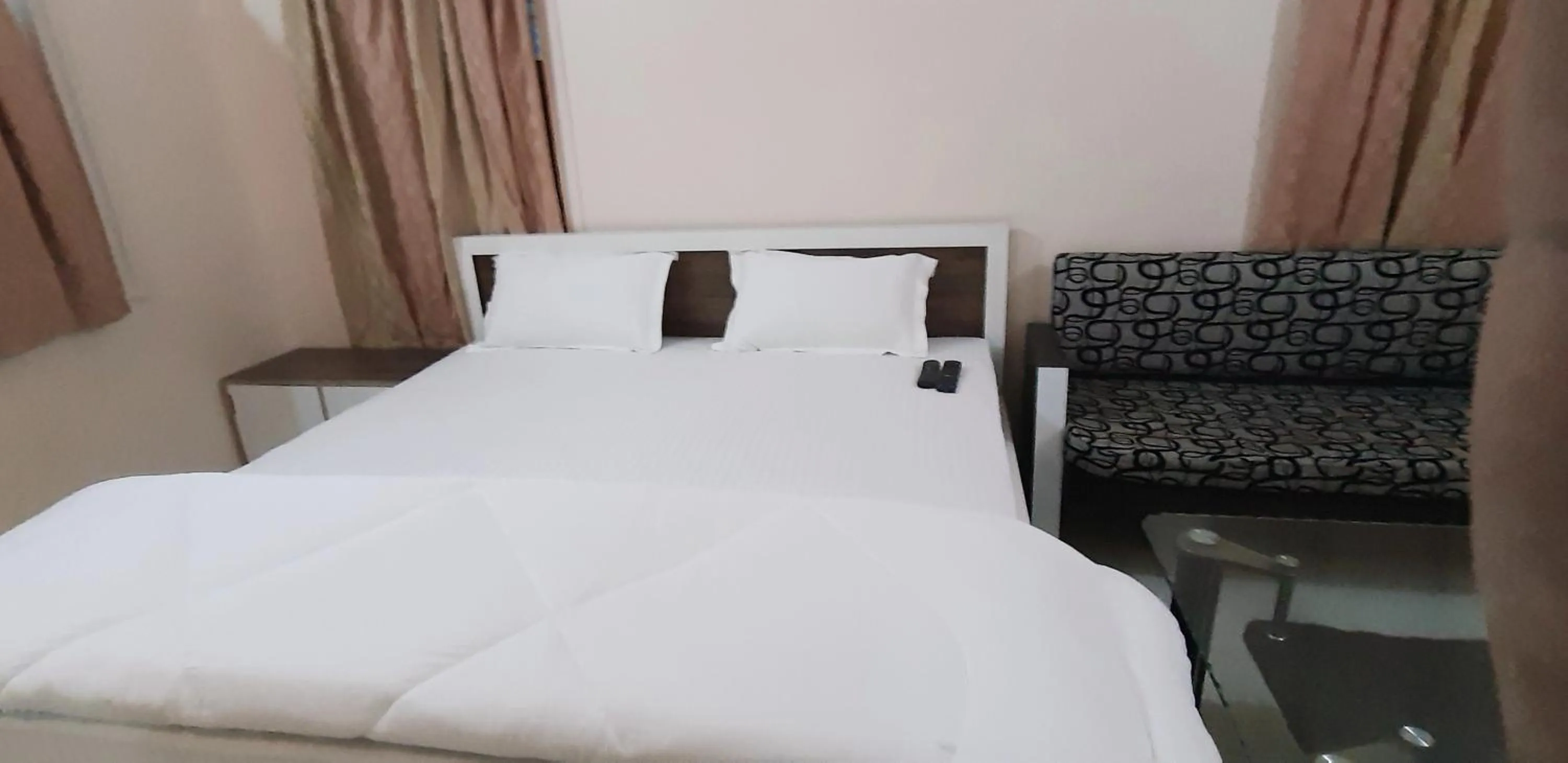 Photo of the whole room, Bed in Sita Inn Home Stay Away From Home By Hotel Sita Varanasi