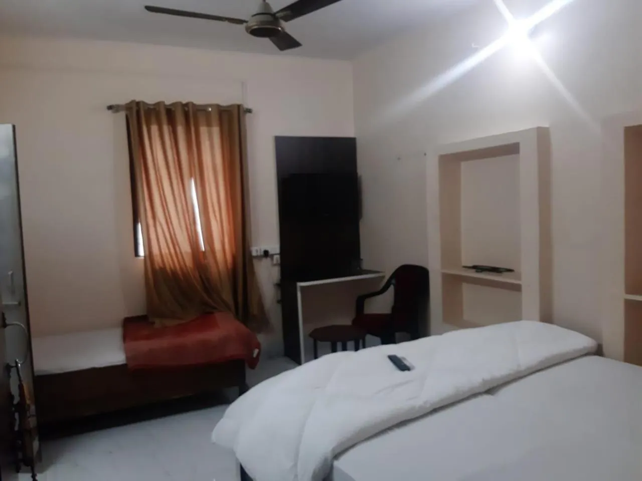 Photo of the whole room, Bed in Sita Inn Home Stay Away From Home By Hotel Sita Varanasi