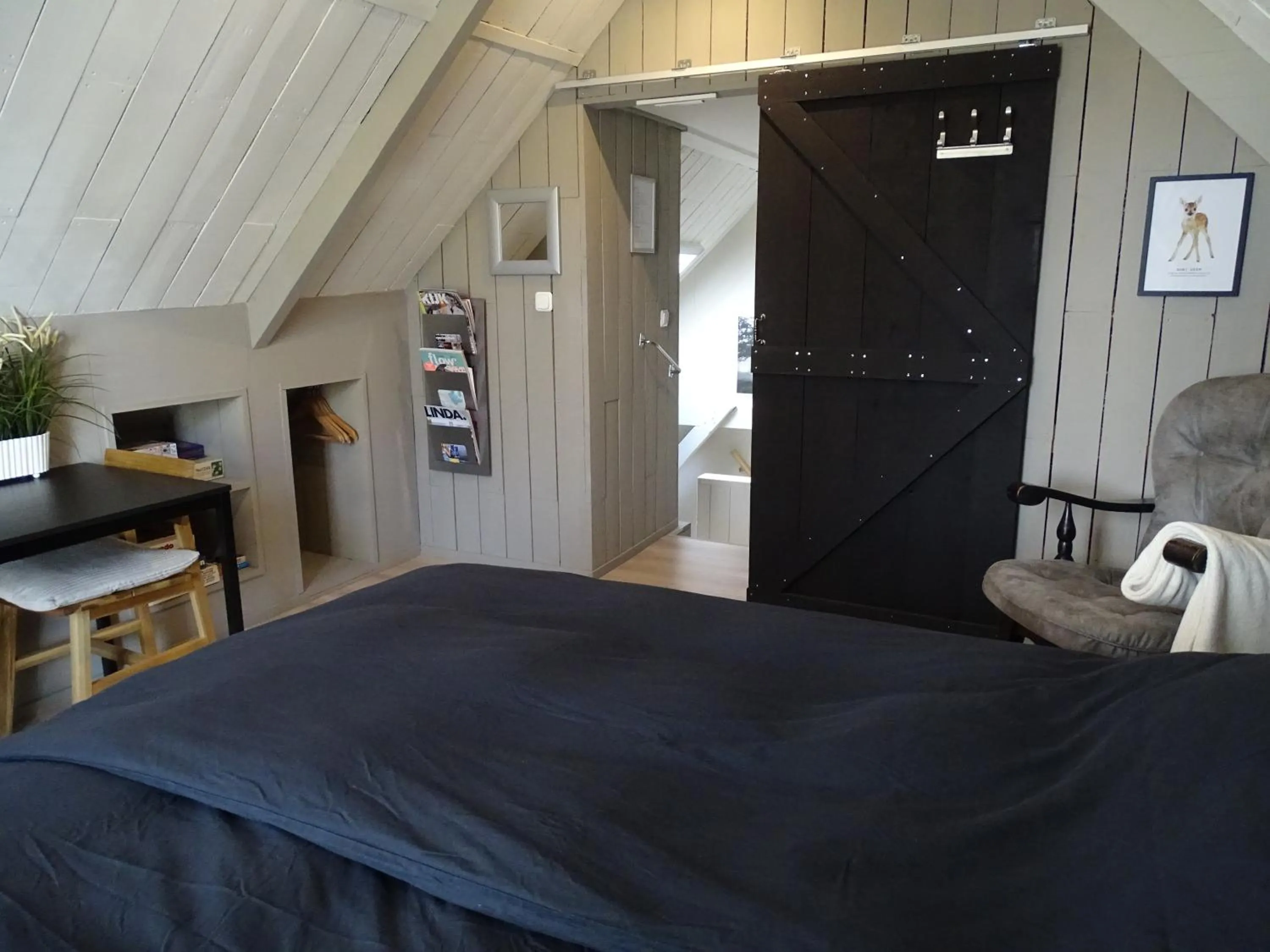 Seating area, Bed in B&B Tulden Farmhouse
