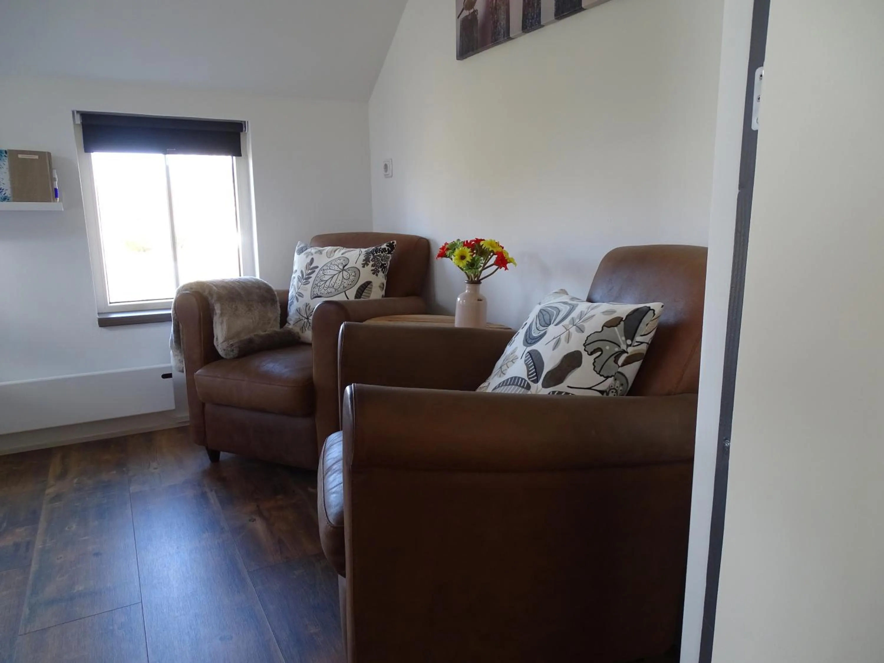 Seating area in B&B Tulden Farmhouse