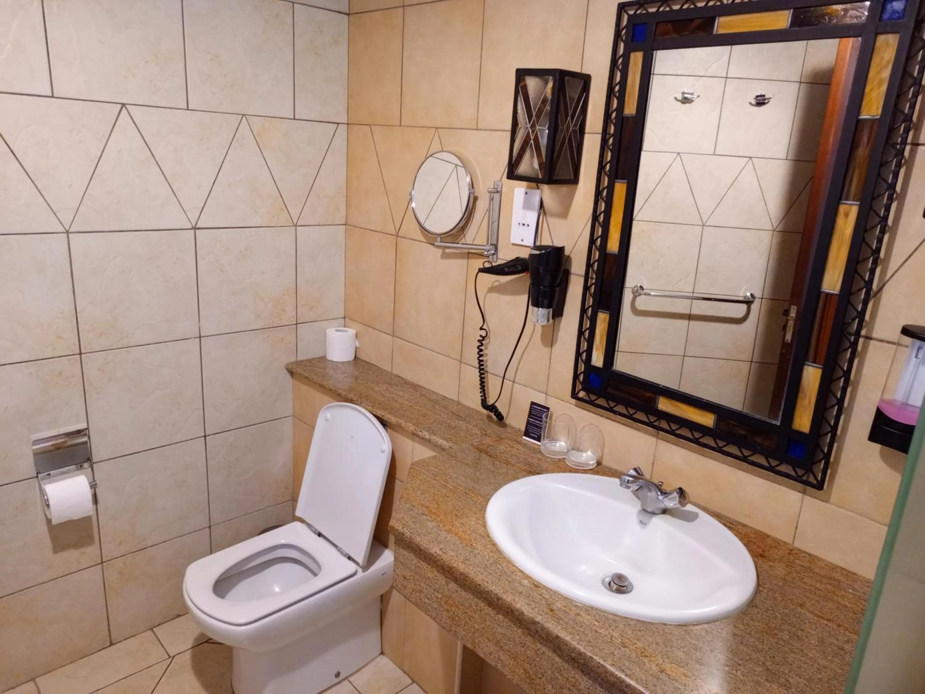 Shower in The Heron By Sarovar Portico India