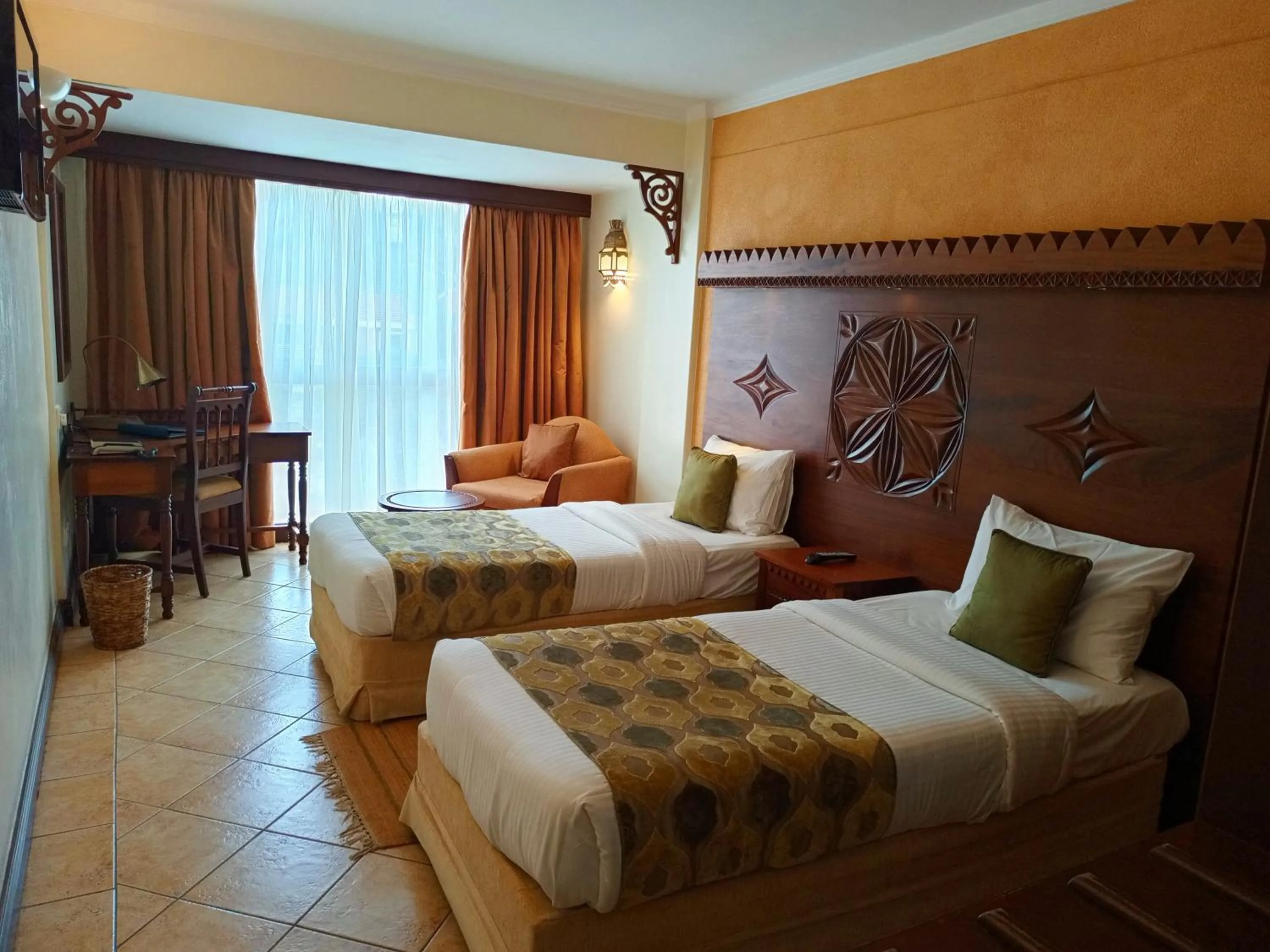 Bed in The Heron By Sarovar Portico India