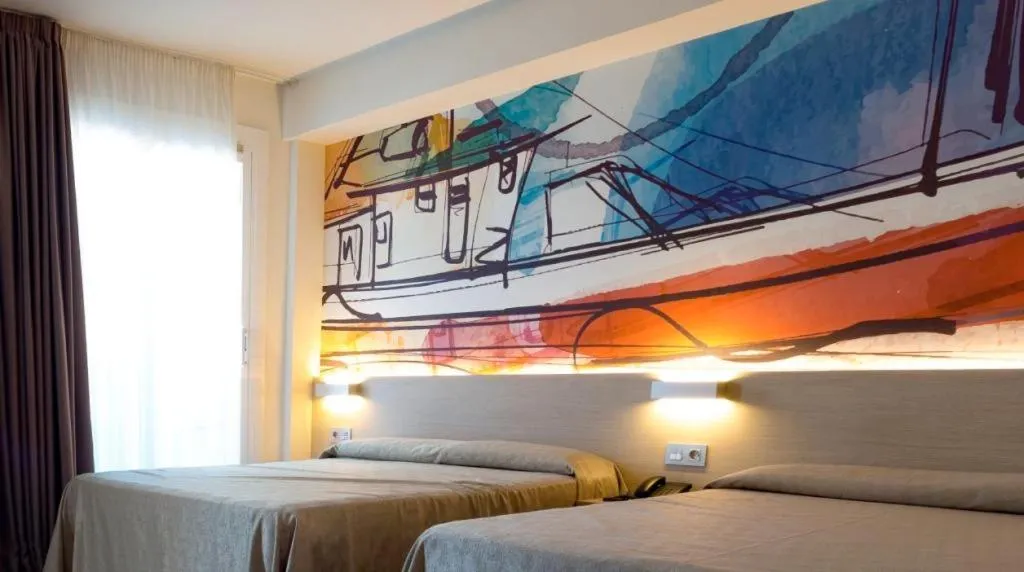 Bed in Hotel Riviera