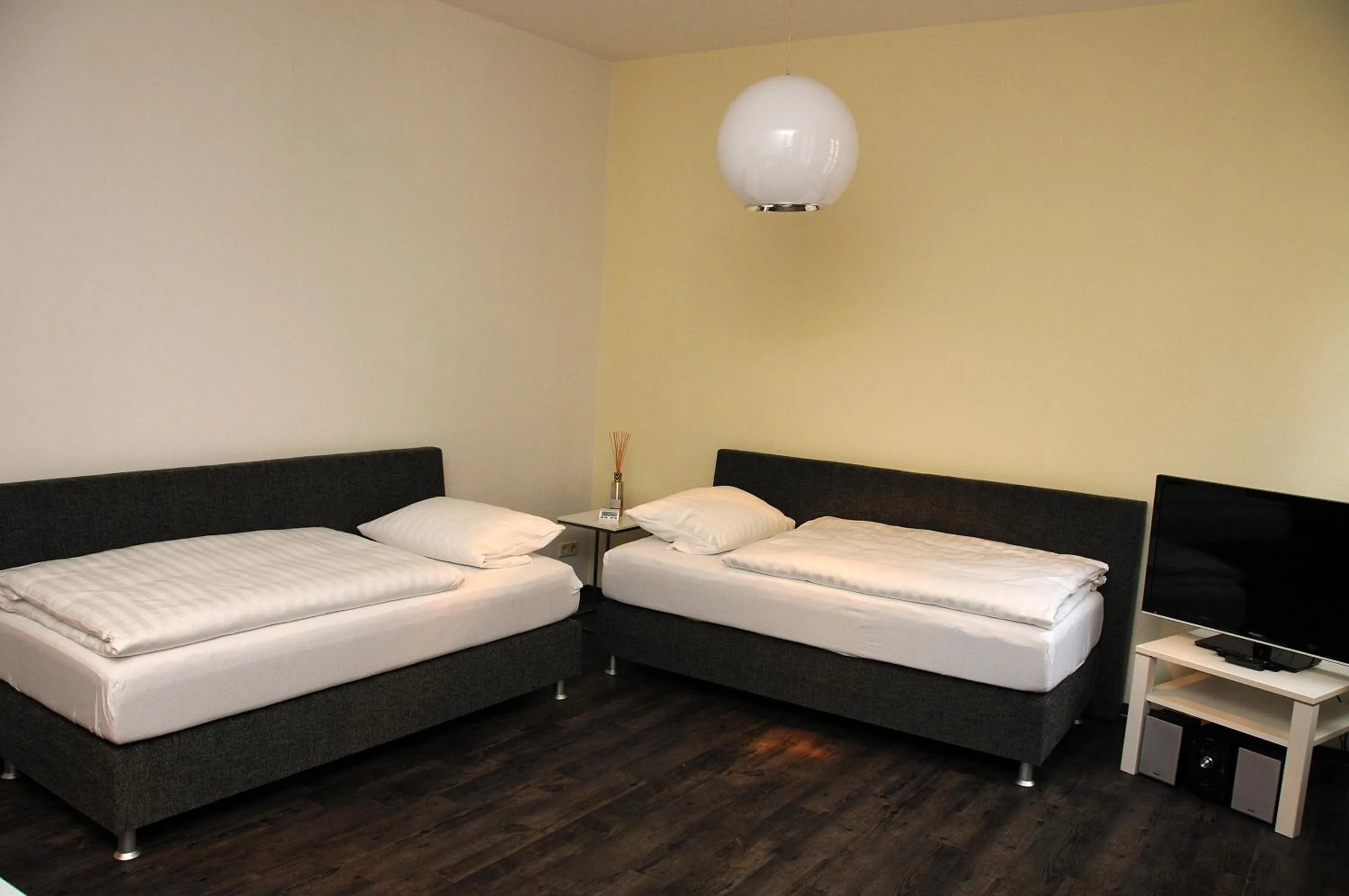 Bed in Apartments am Brunnen