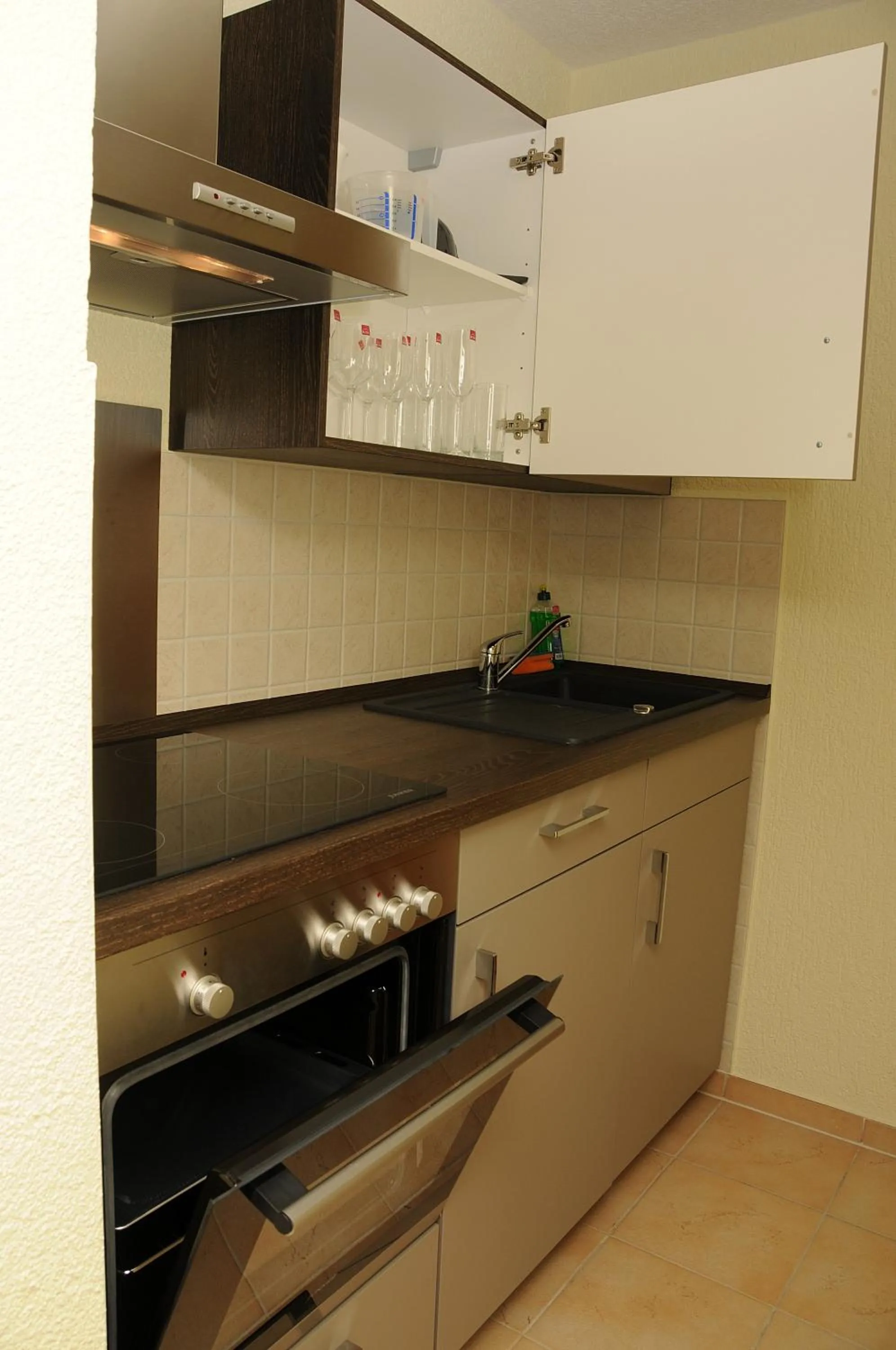 Kitchen or kitchenette in Apartments am Brunnen