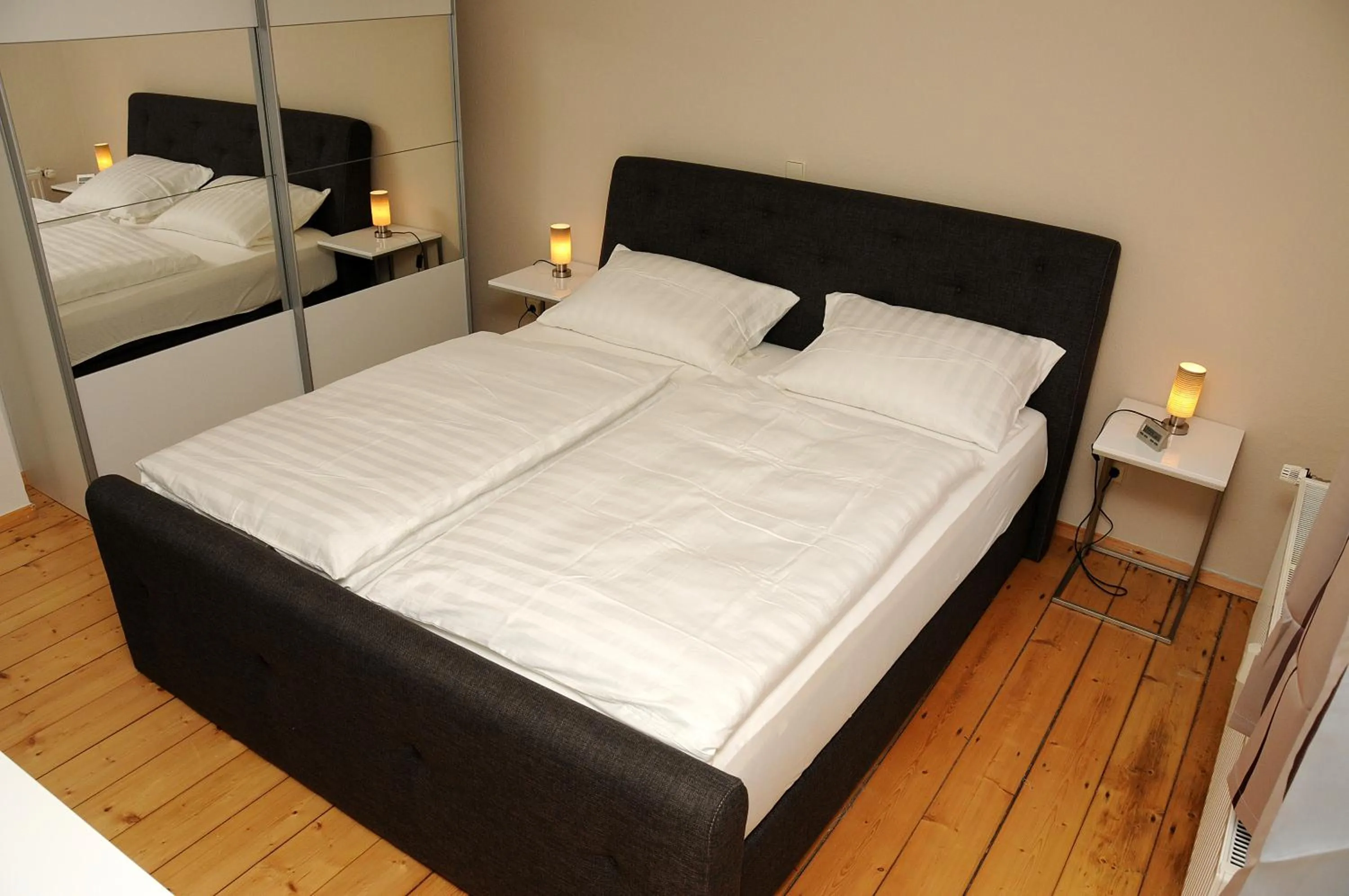 Bed in Apartments am Brunnen