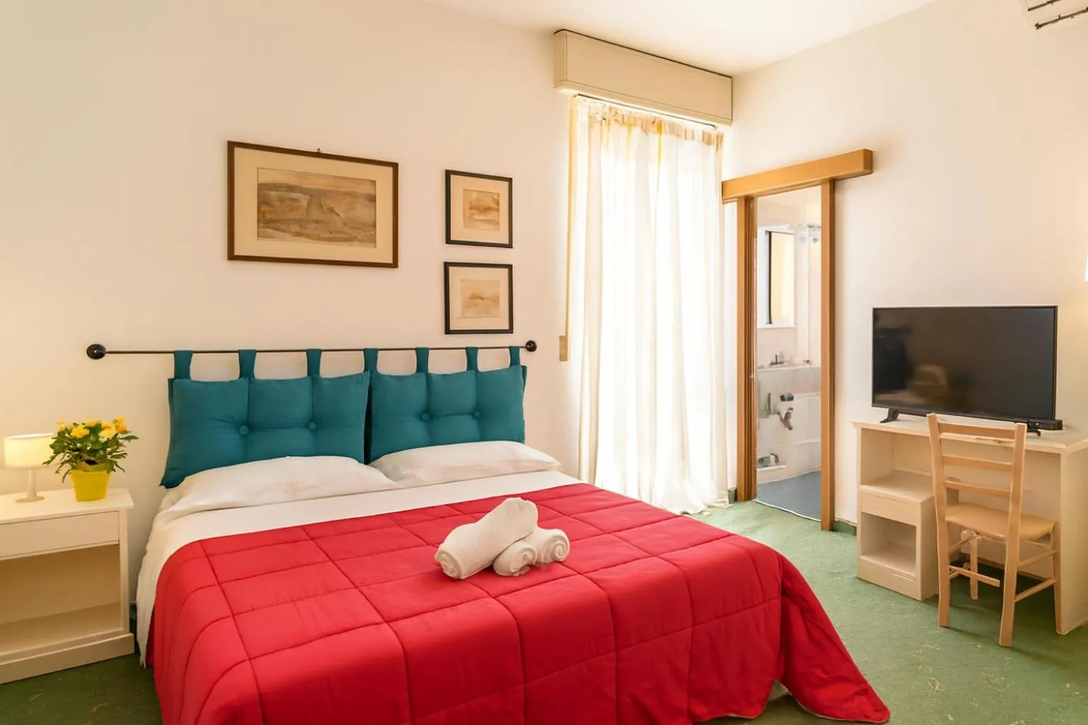 Bed in Hotel Ariston