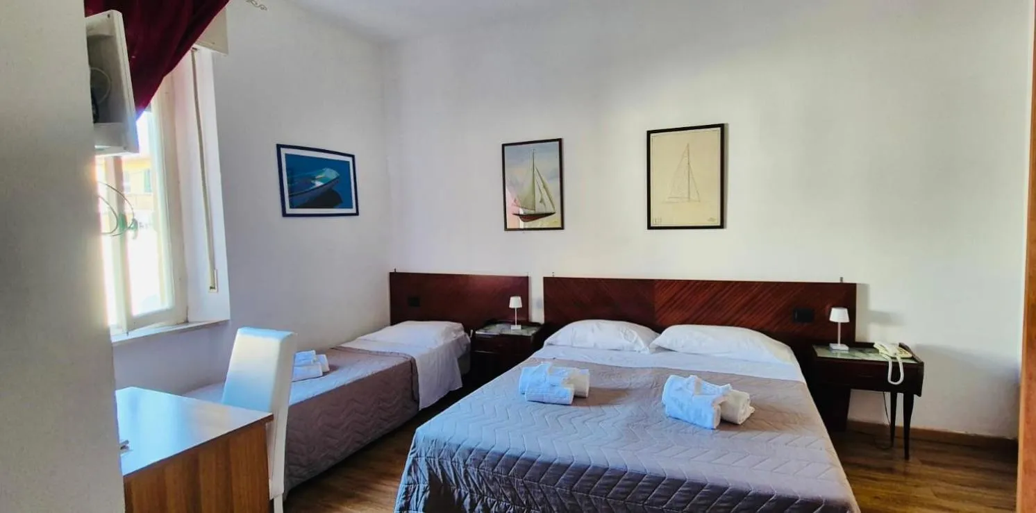 Bed in Hotel Ariston