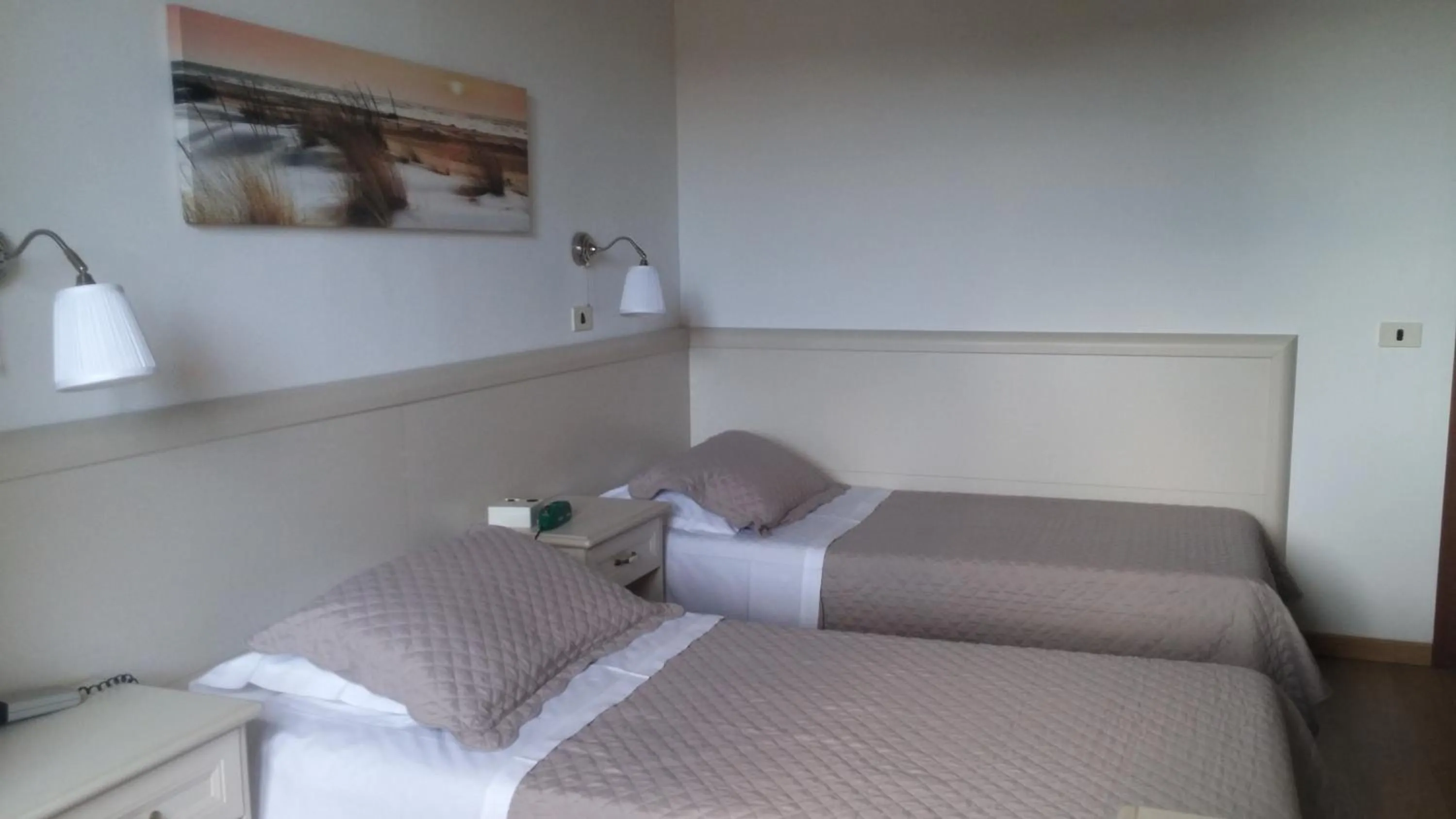 Bed in Hotel Ariston