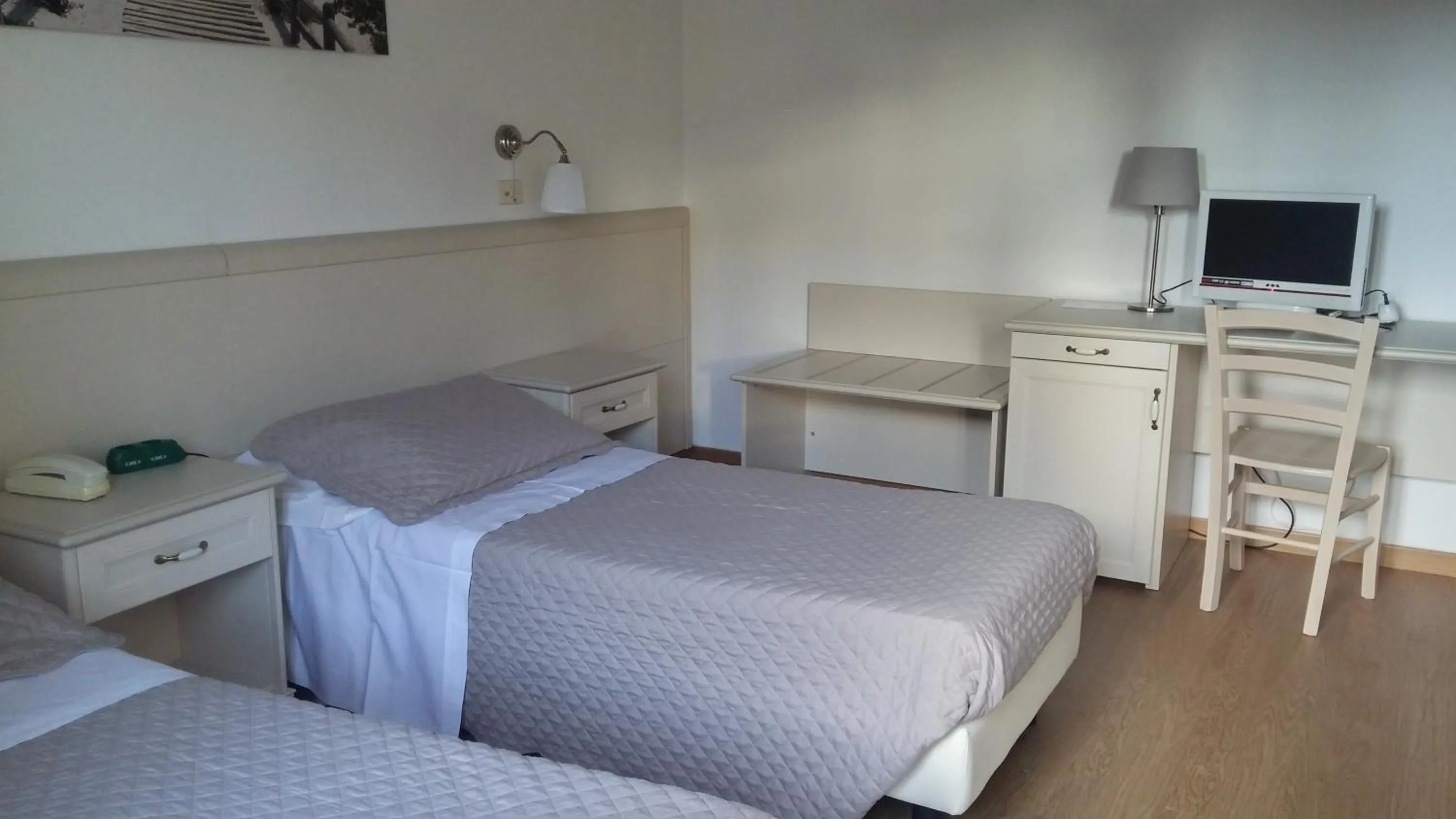 Bed in Hotel Ariston