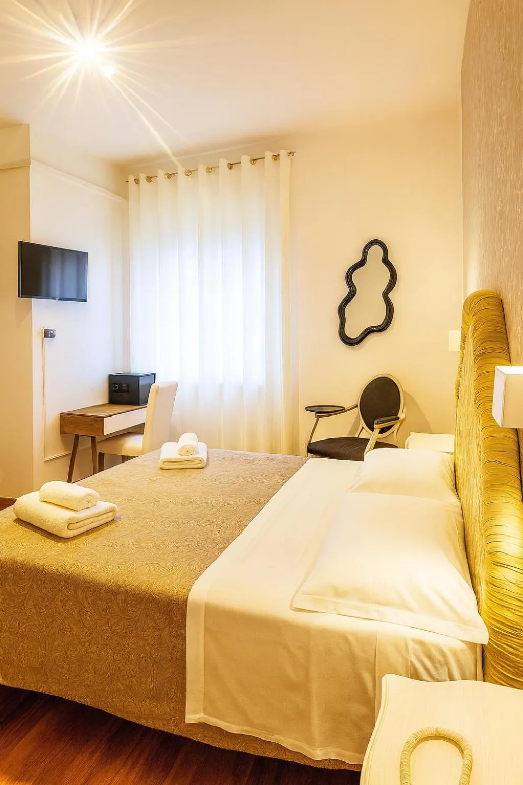 Bed in Hotel Ariston